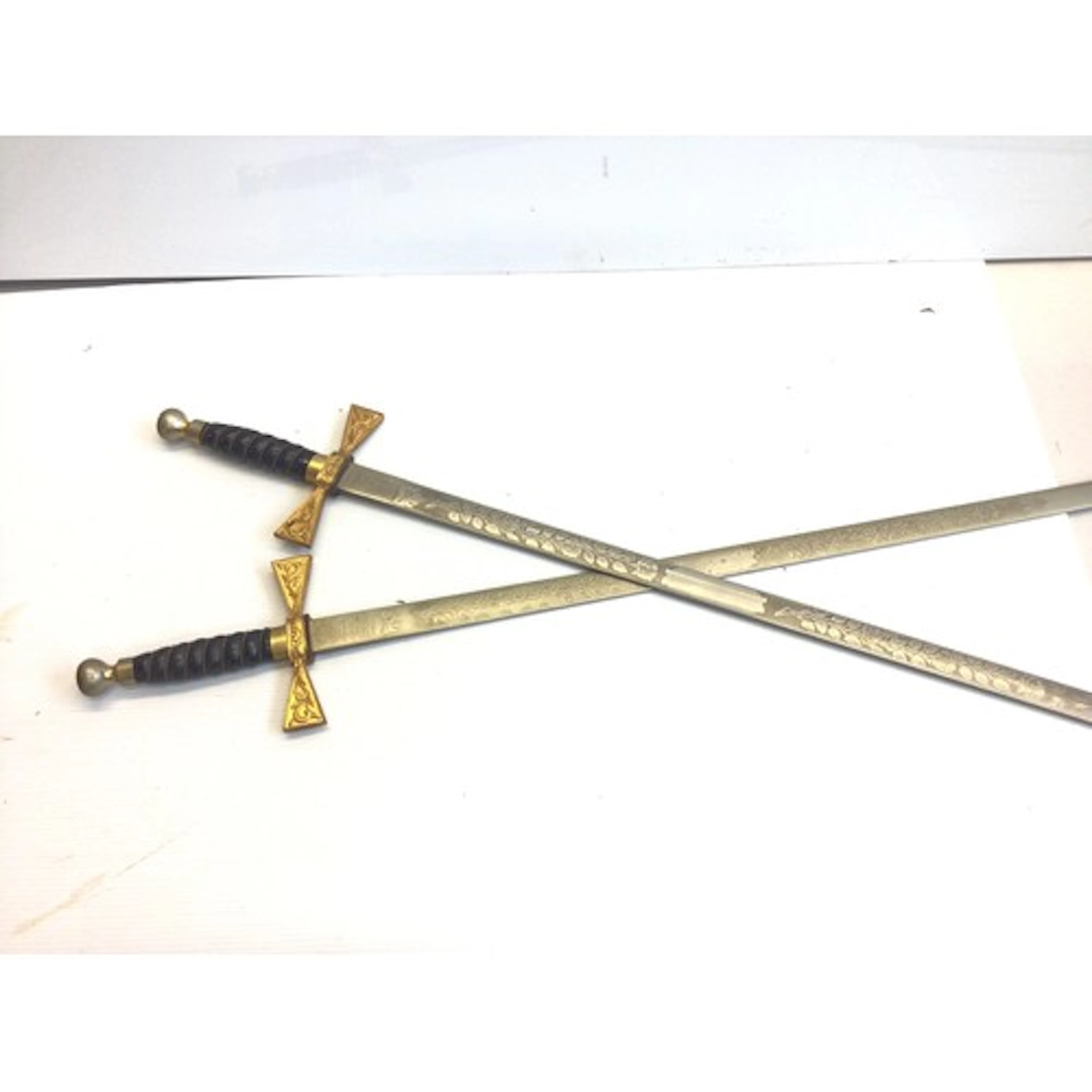 A Pair of Ornamental Wilkinson swords the etched blades with...