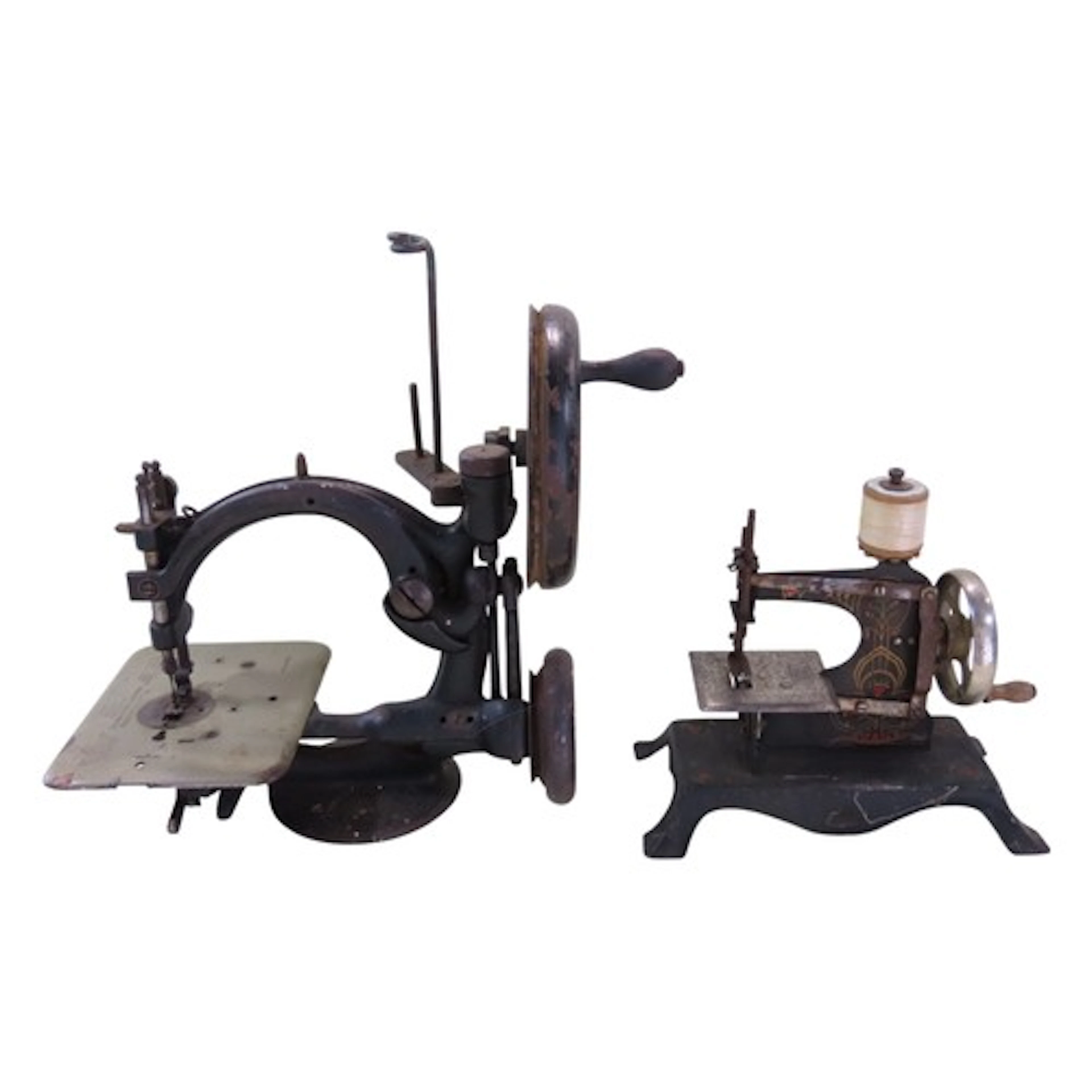 Two 19th century sewing machines, one by Willcox & Gibbs, wi...