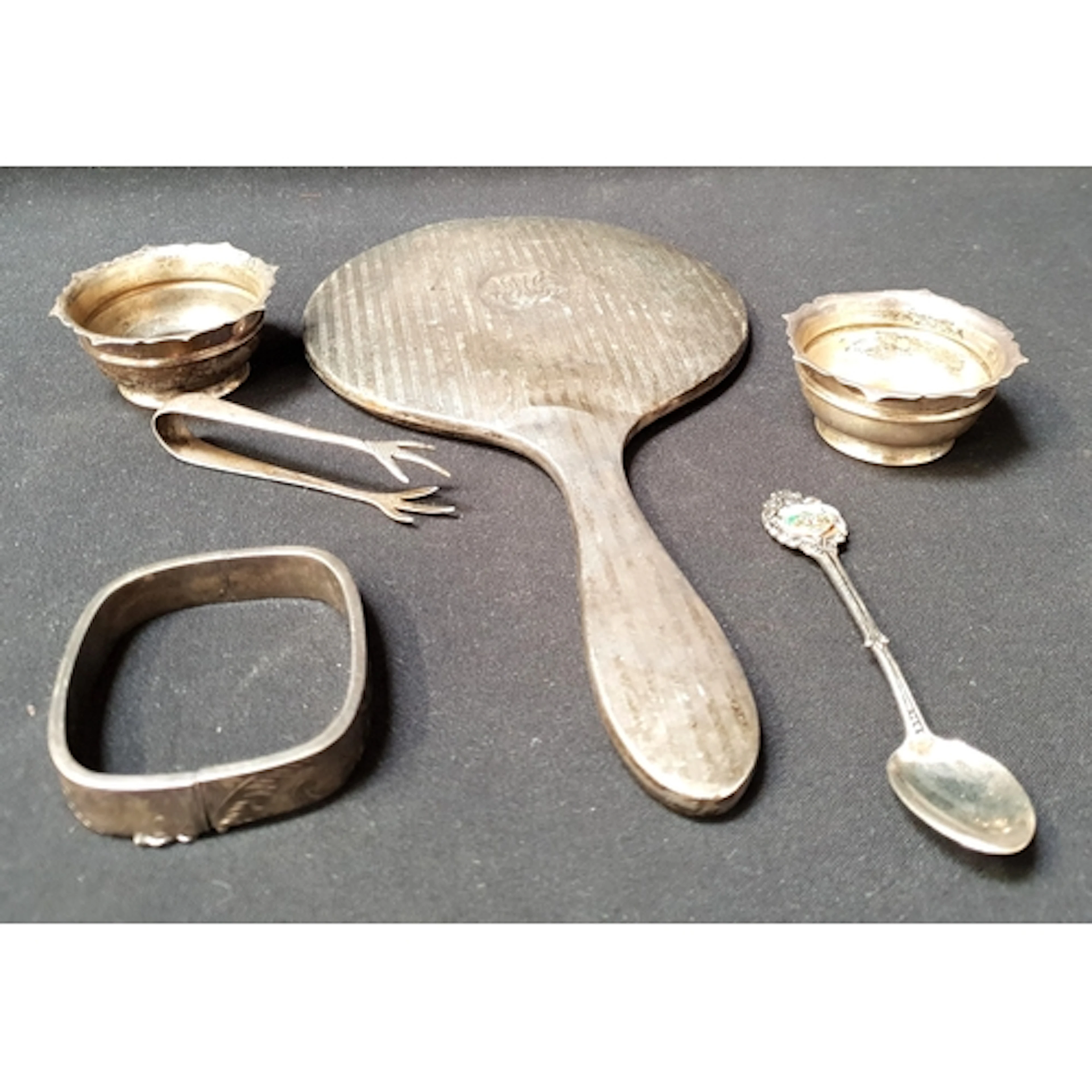 COLLECTION OF SILVER ITEMS comprising a square-profile hing...