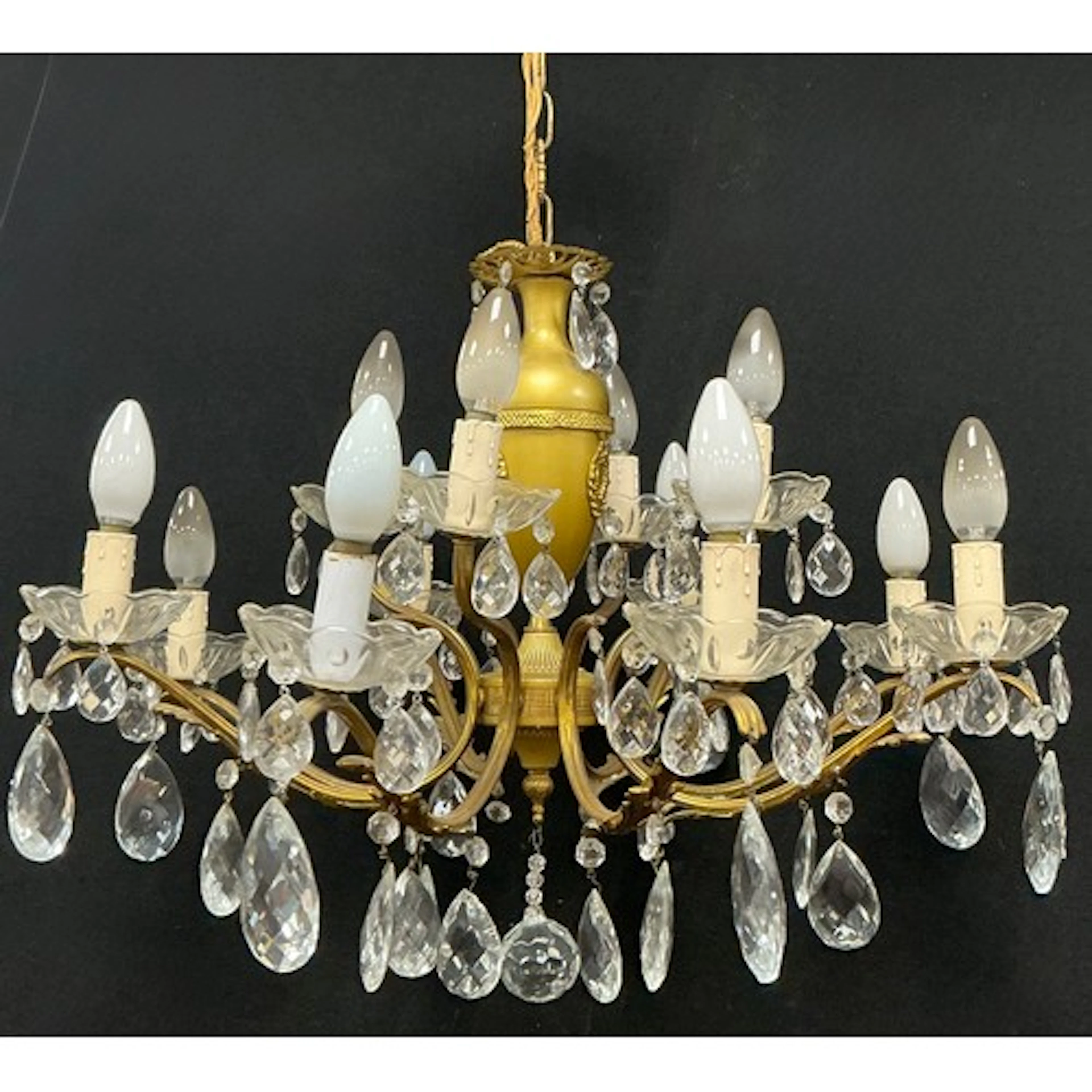 An eight branch chandelier, classical urn style centre with ...