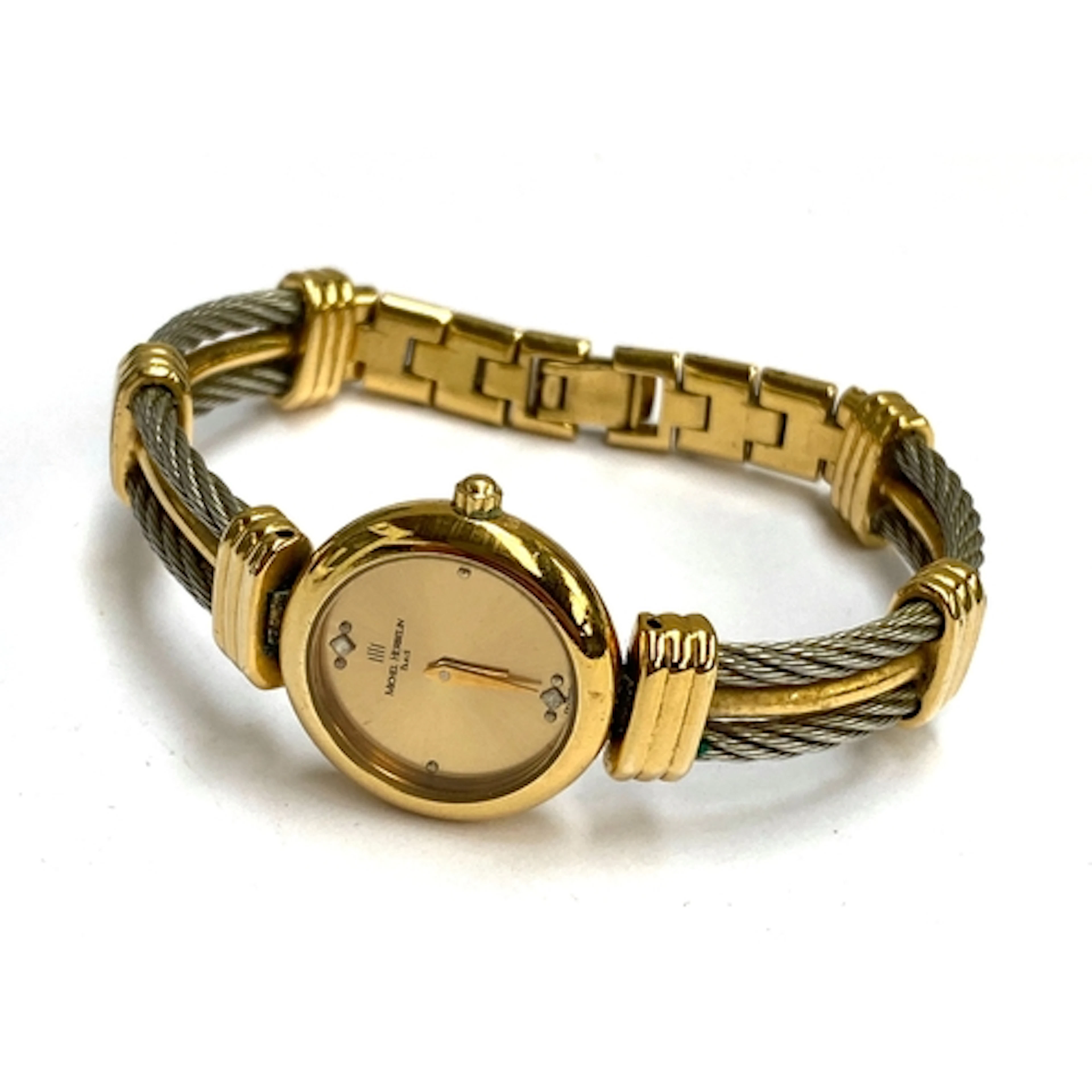 A ladies Michel Herbelin Paris stainless steel cable and gol...