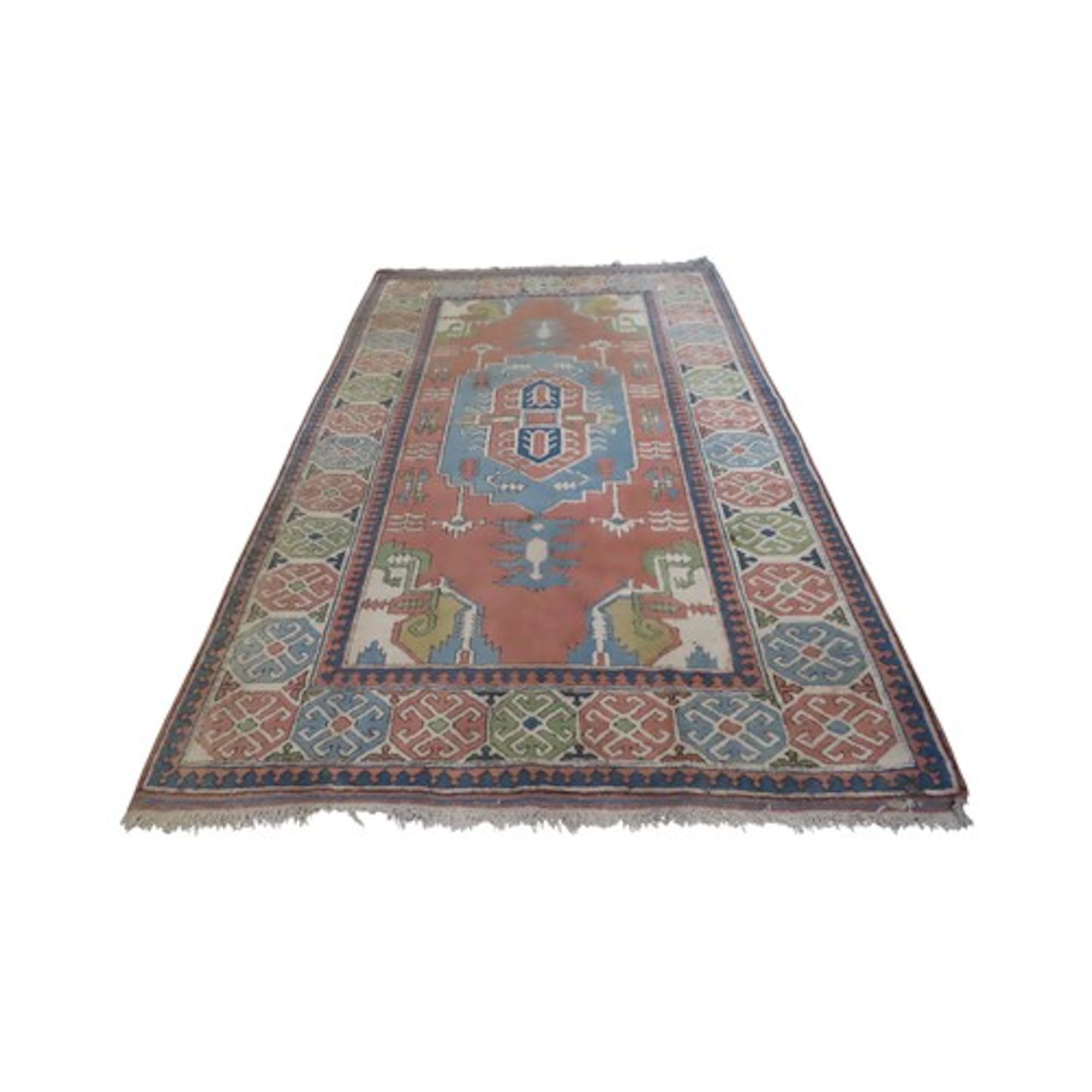 A Turkish wool carpet in pastel shades, with geometric detai...