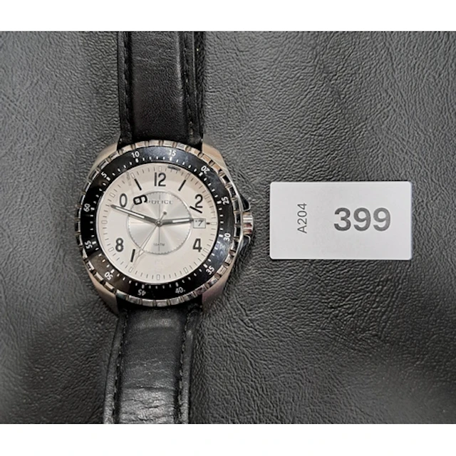 POLICE MIAMI WRISTWATCH model 13669J, on black leather strap...