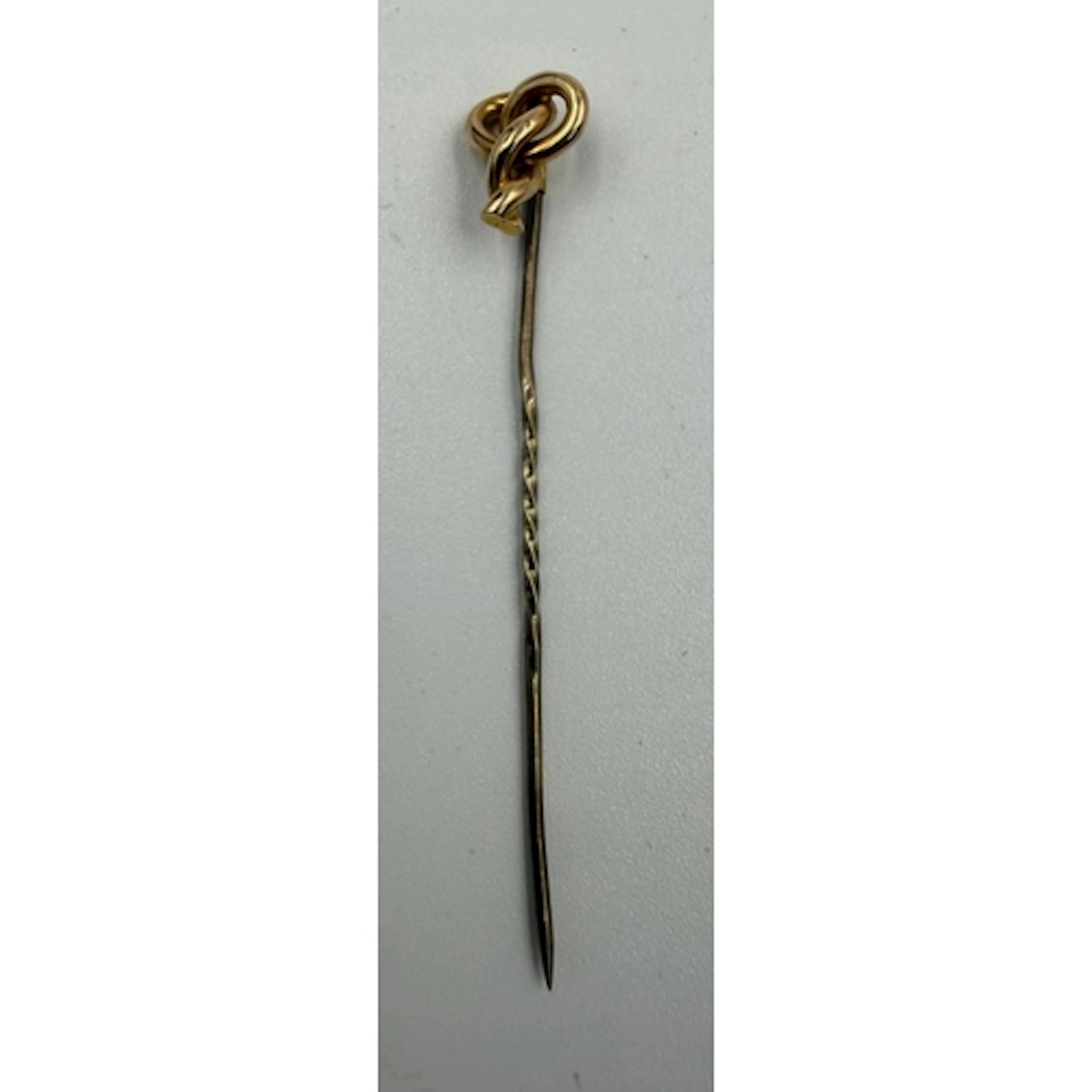 A 15ct gold stick pin