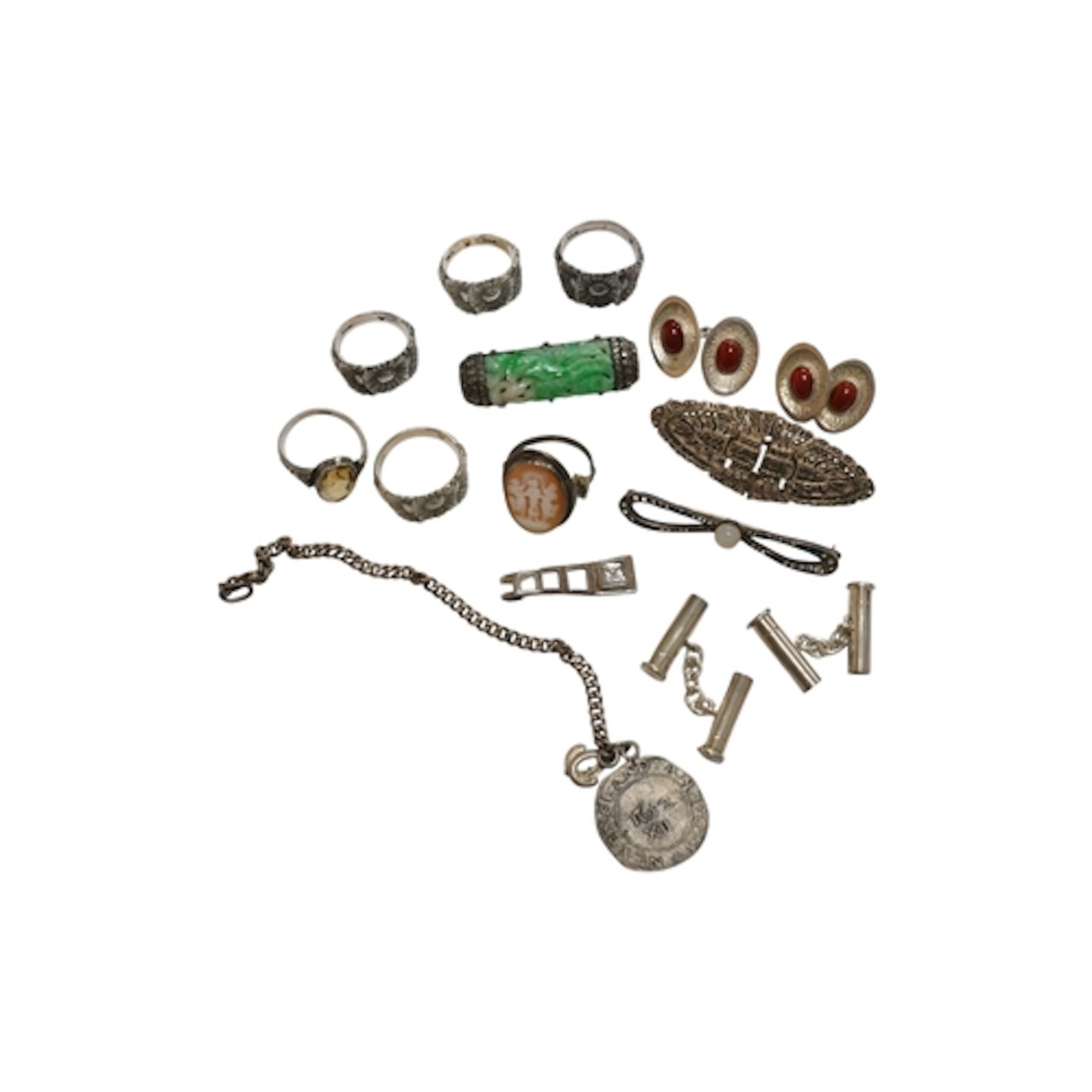 A collection of jewels, including four silver rings of flora...