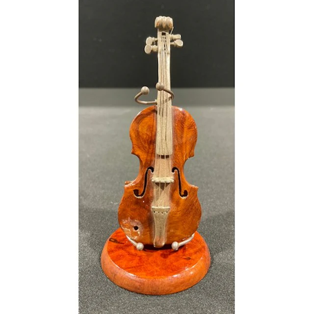 A silver and walnut miniature violin, 9.5cm high, with stand...