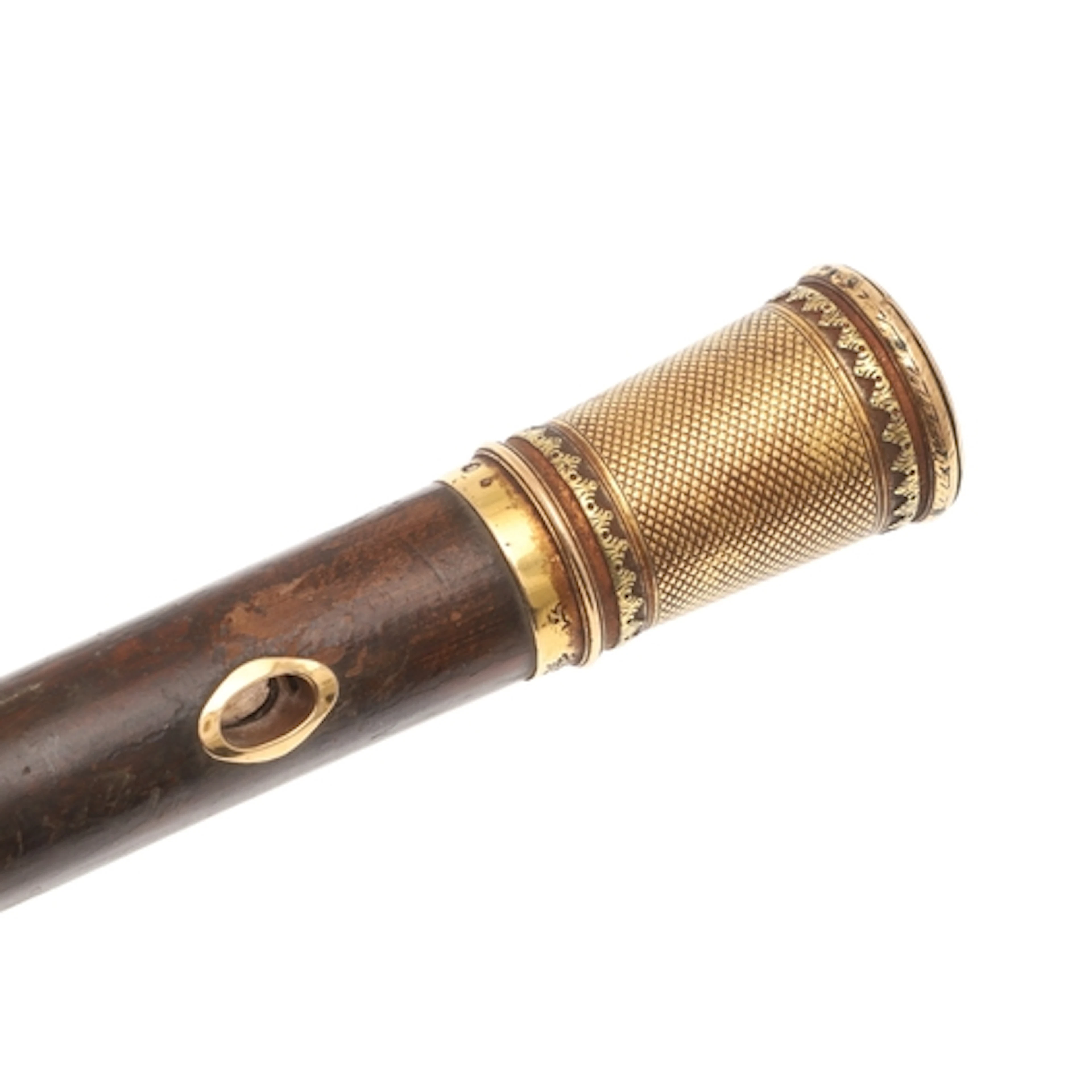 A FRENCH GOLD MOUNTED CANE. the wood shaft with gold top wit...