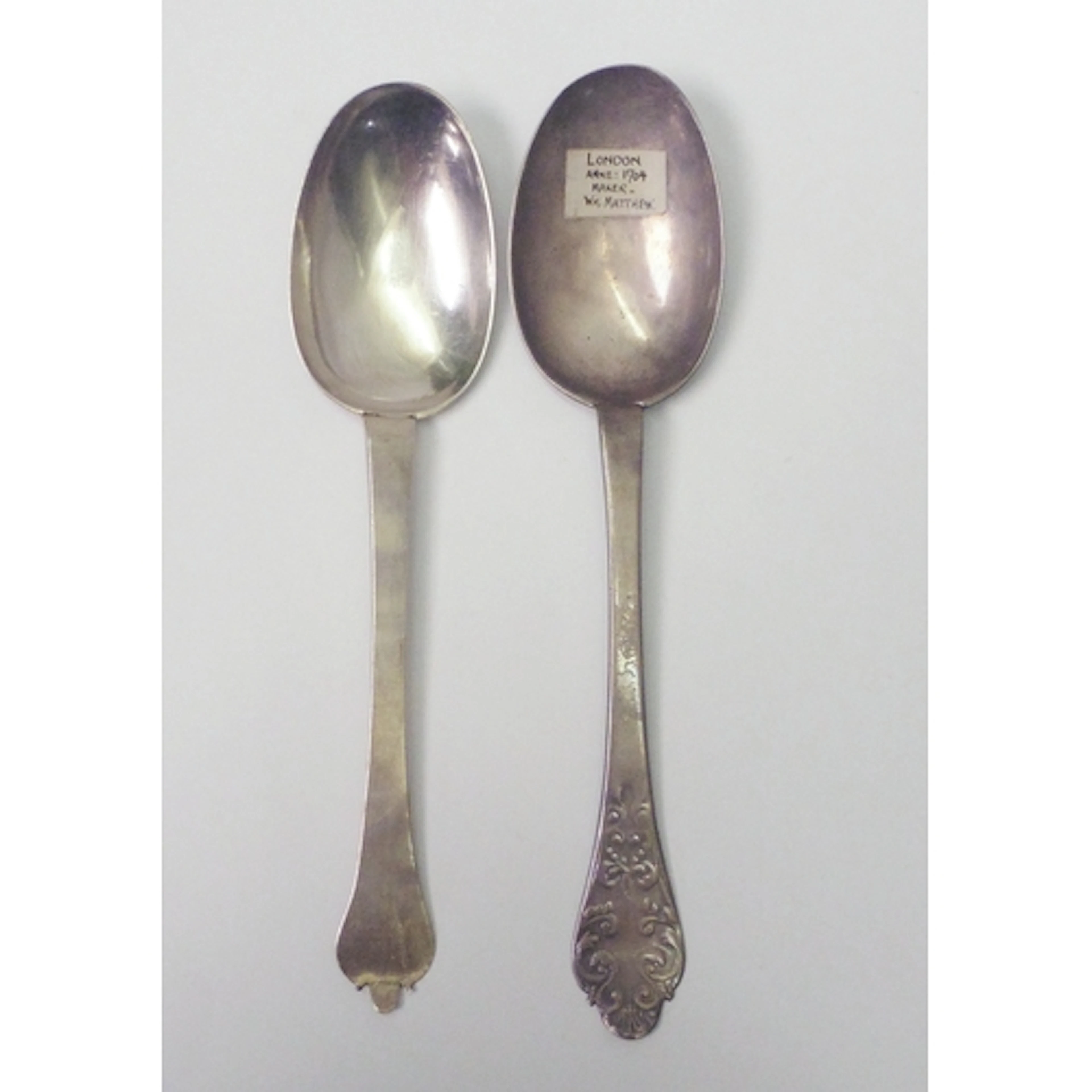Two late Stuart silver trefid spoons, one by Francis Archbol...
