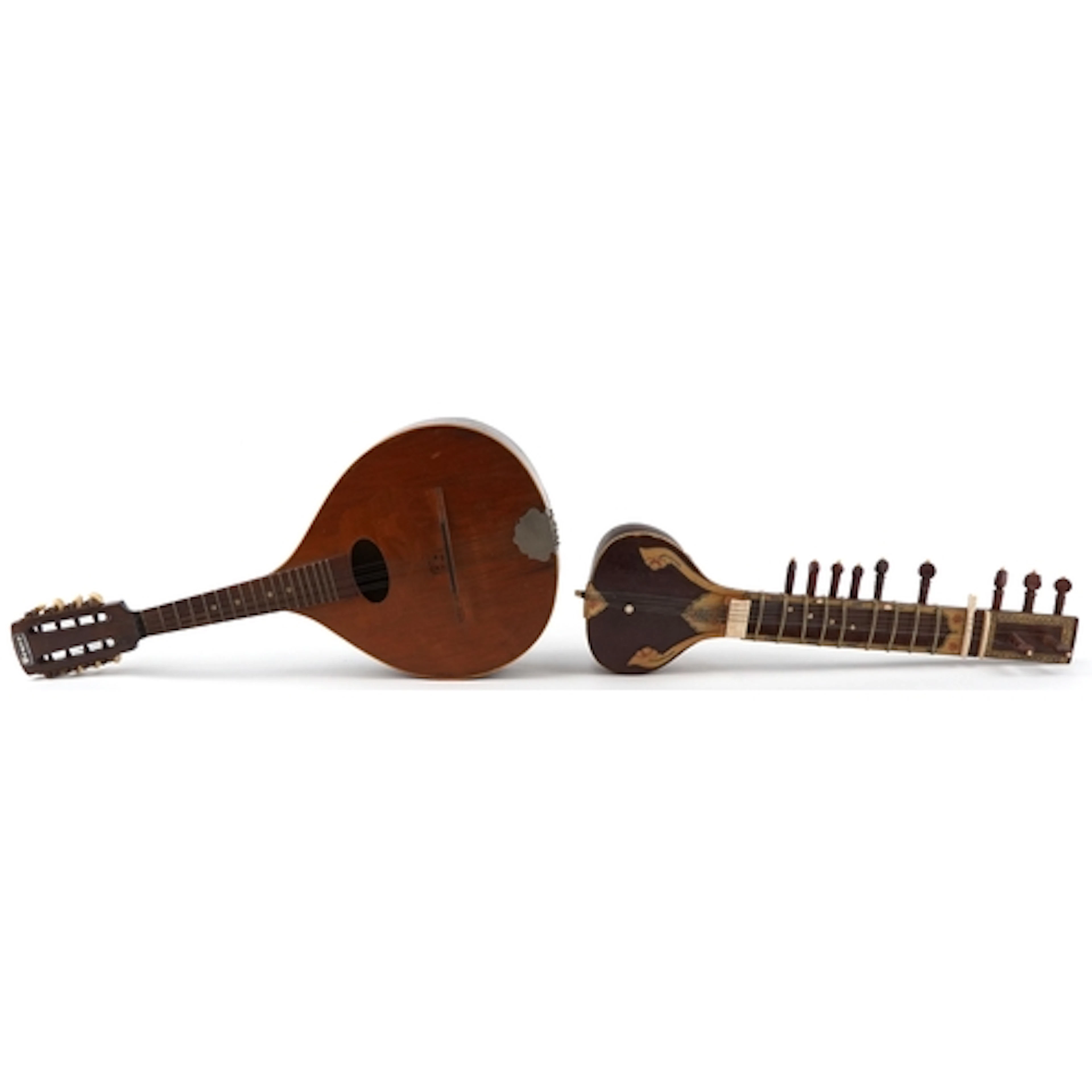 Musical instruments comprising a Hora Reghin mandolin and a ...