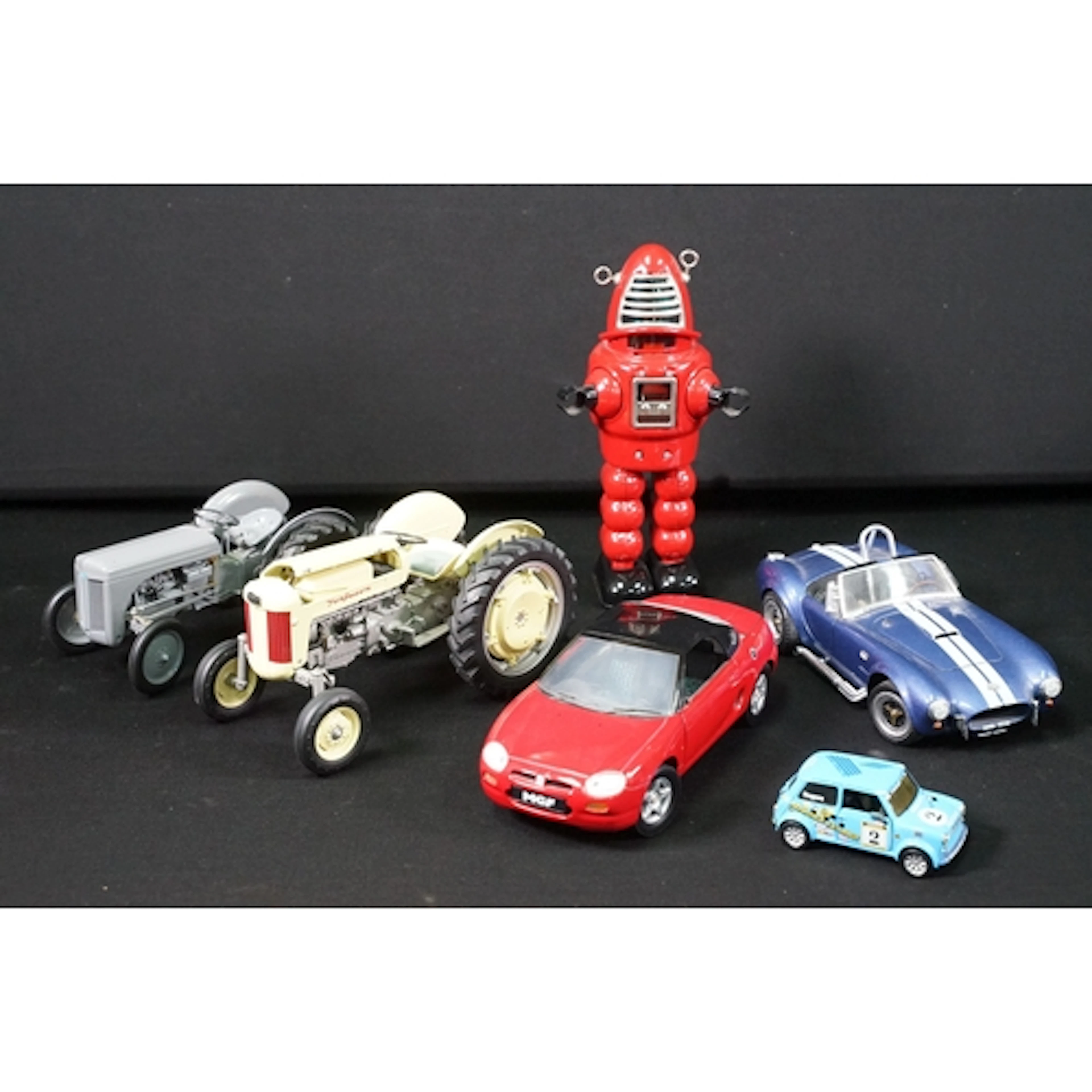 Five diecast models to include 2 x Universal Hobbies tractor...