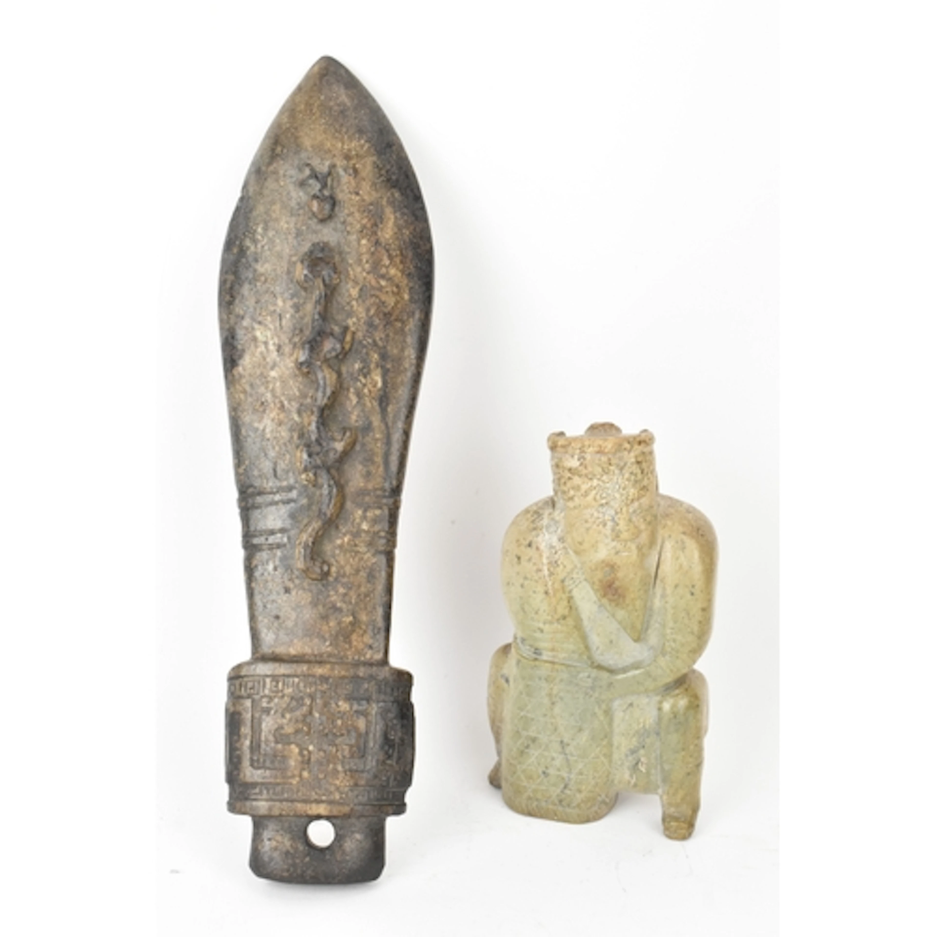 A Chinese carved hardstone figure and an archaistic hardston...