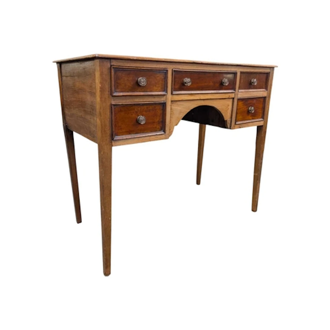 An Edwardian mahogany writing table desk. Flared rectangular...
