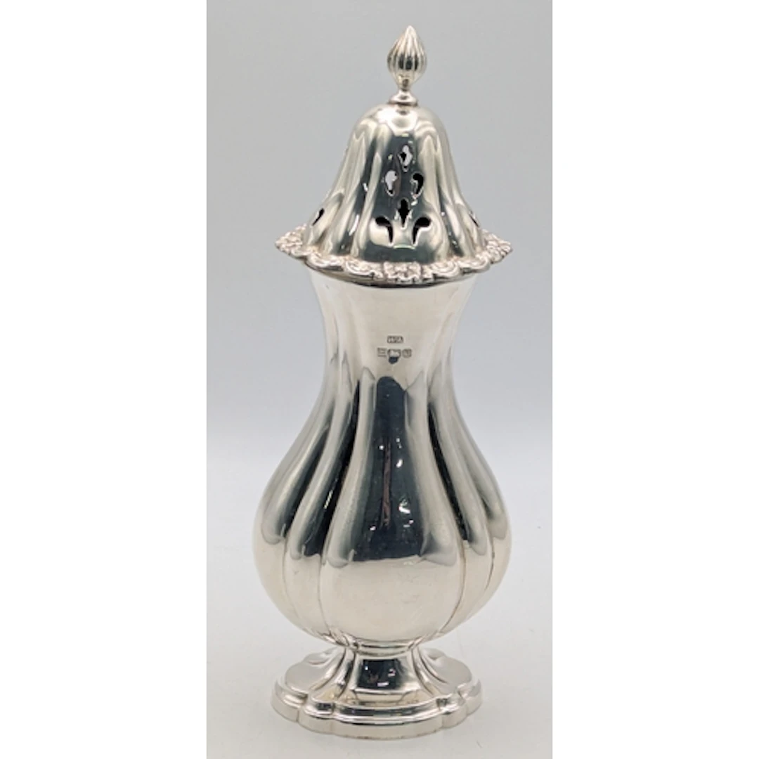 A silver sugar caster, hallmarked Birmingham 1978 by William...