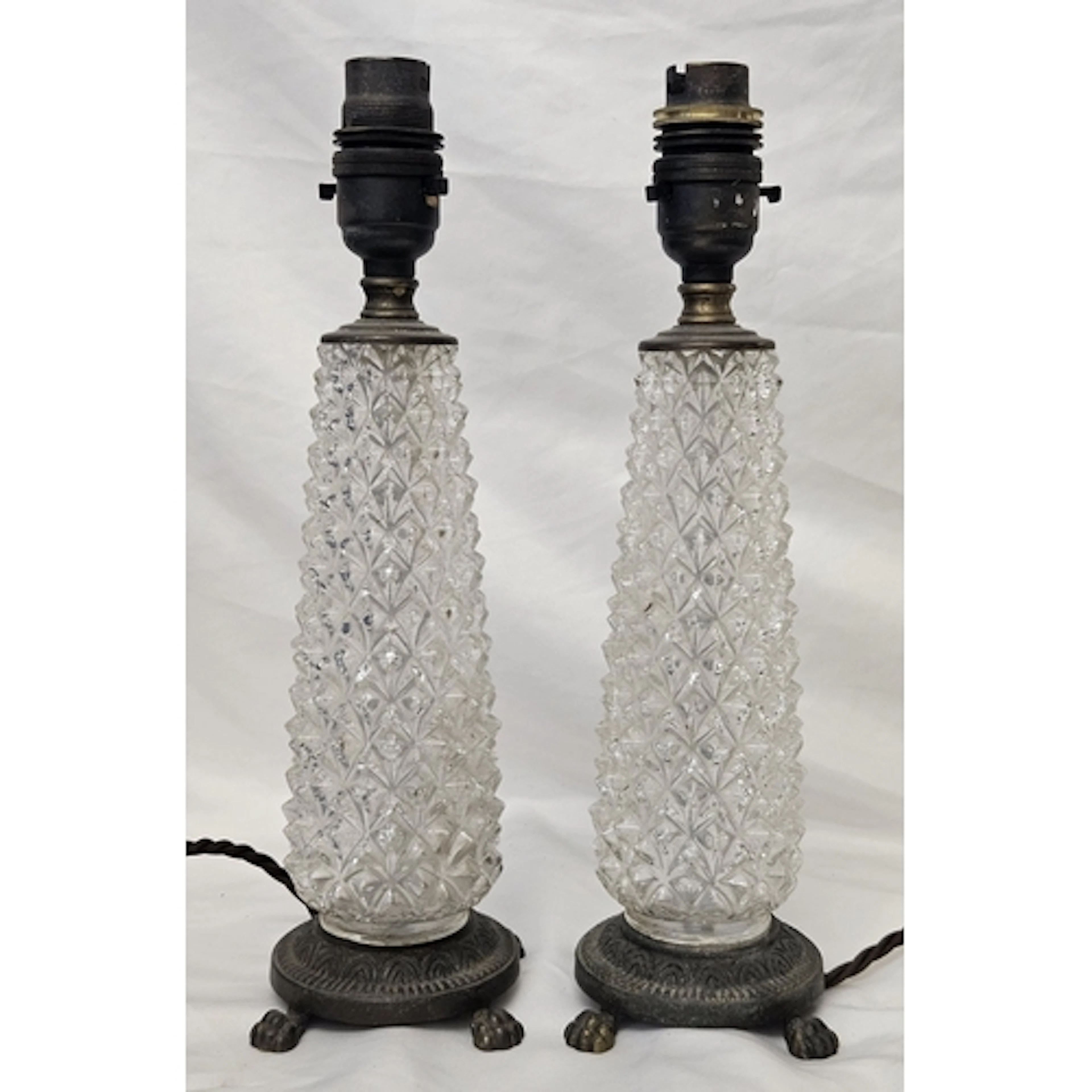 Pair Pressed Glass Table Lamps with brass fittings on circul...