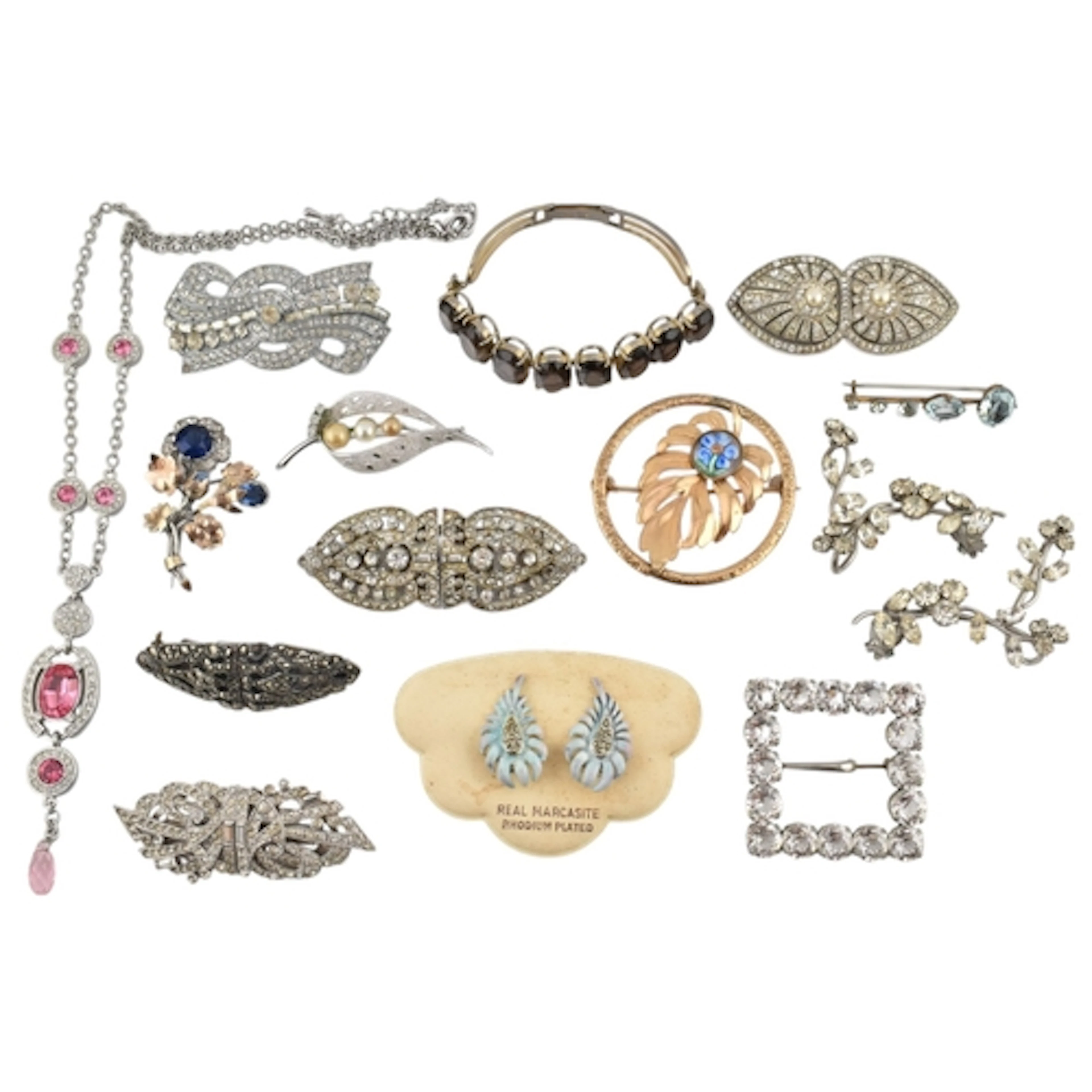 Collection of brooch pins, bracelets and clip-on earrings. A...