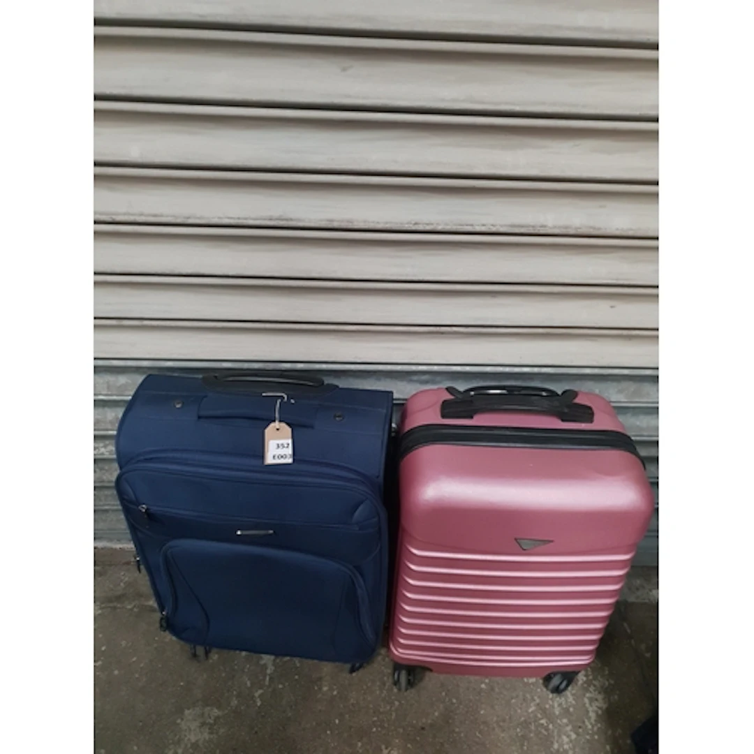 TWO SUITCASES comprising Rocklands and Troya Note: cases and...