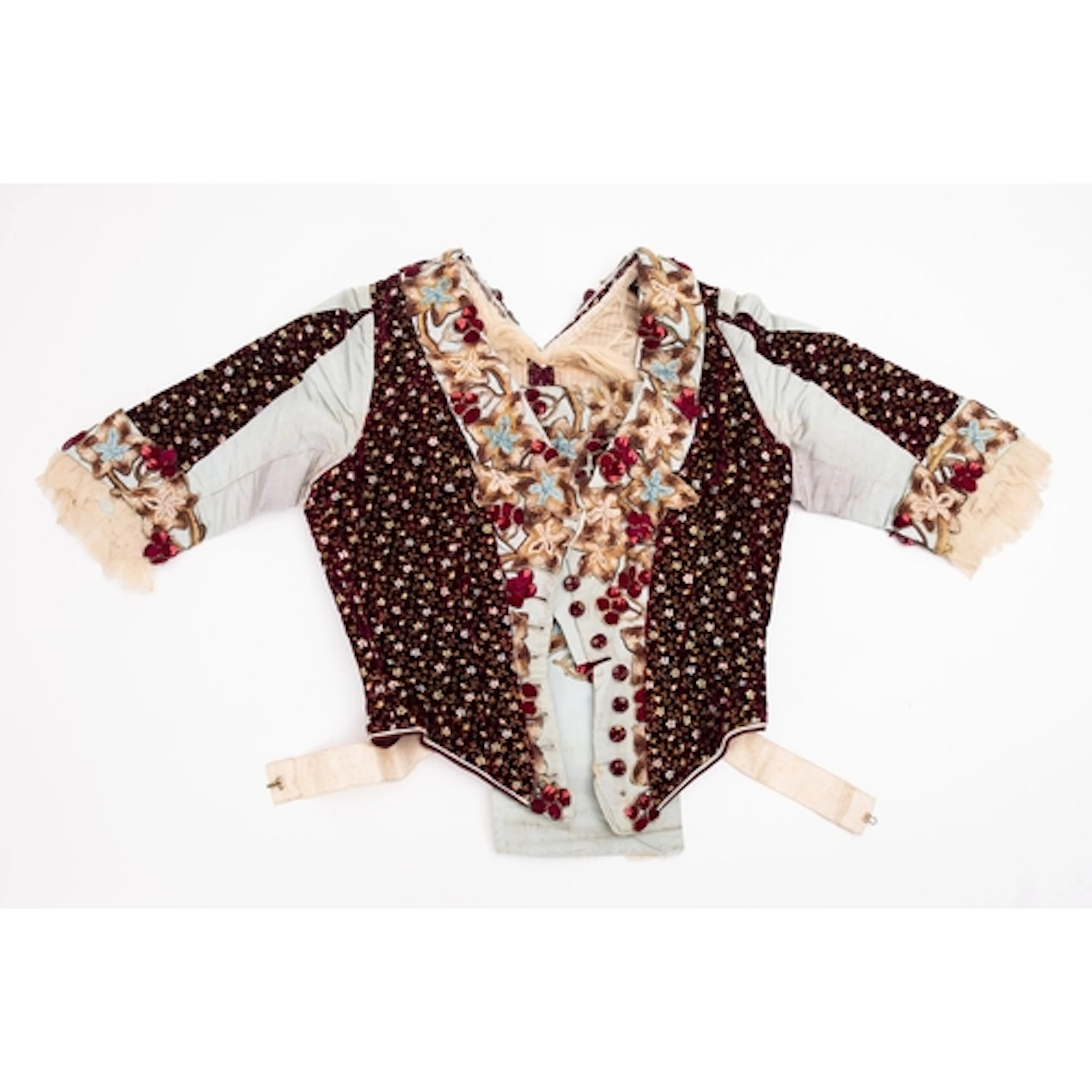A Victorian silk and embroidered lady's bodice. Of blue silk...