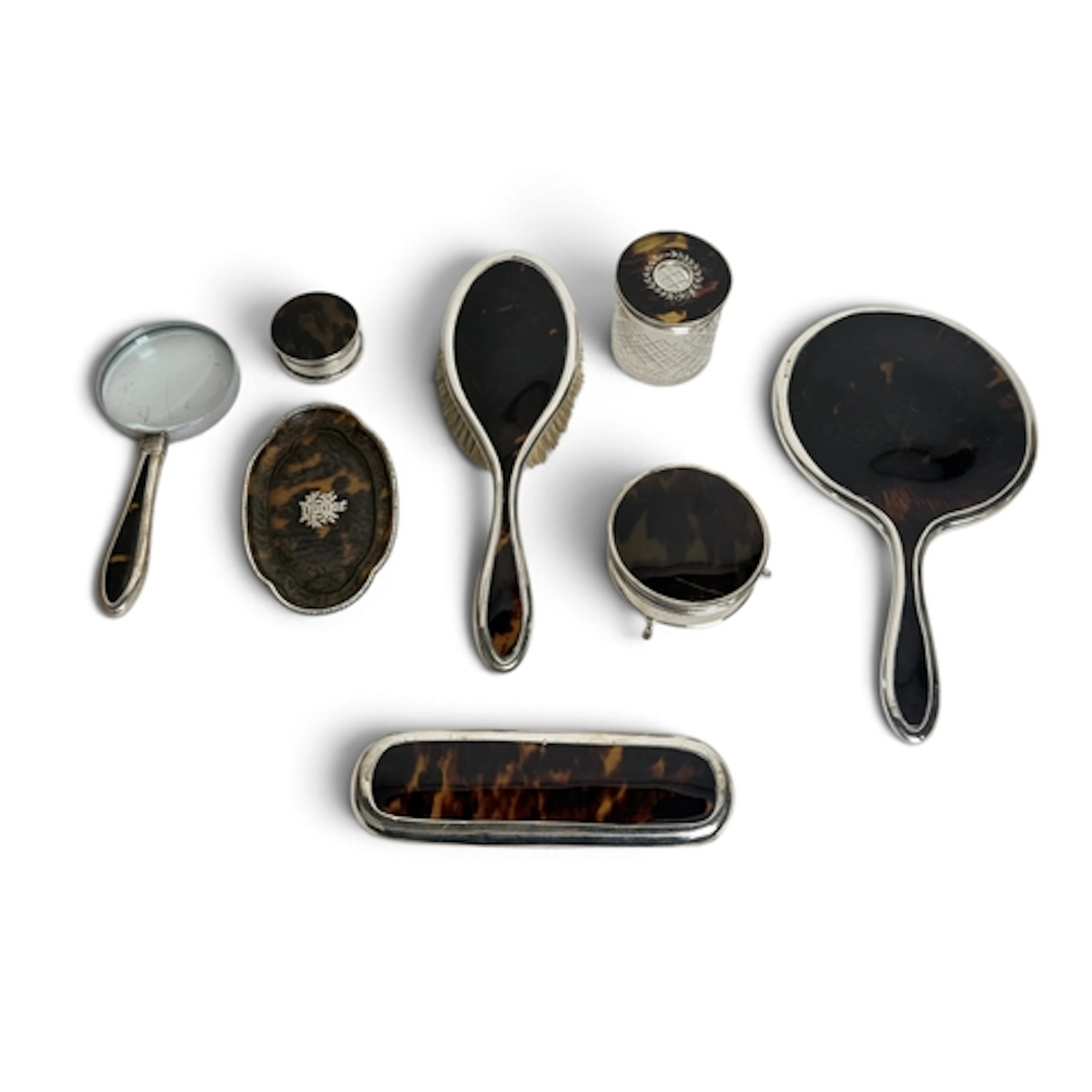 A COLLECTION OF SILVER MOUNTED TORTOISESHELL VANITY ITEMS To...