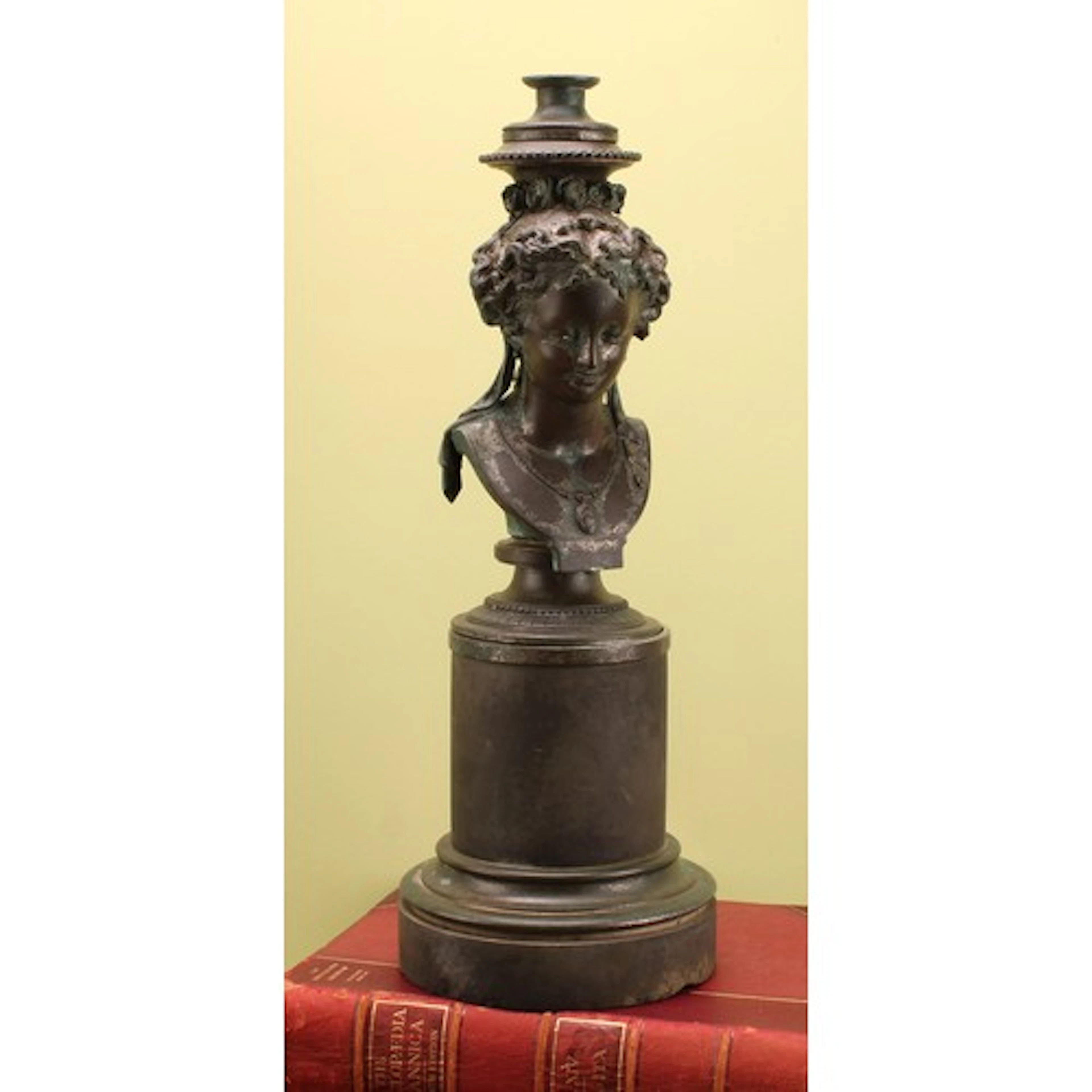 A French Belle Époque patinated bronze and black slate portr...