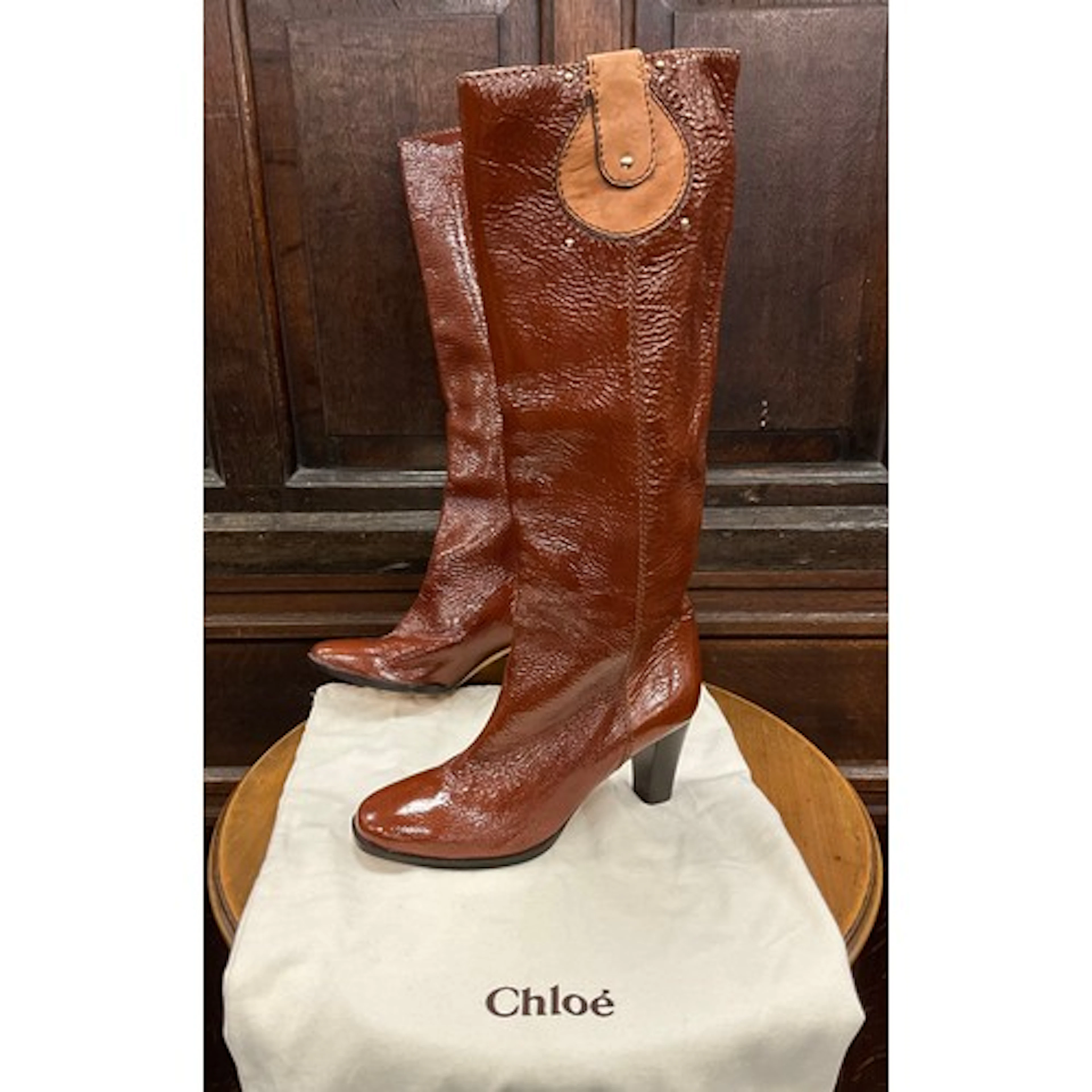 Fashion- a pair of Chloe Paddington knee-high boots, crinkle...