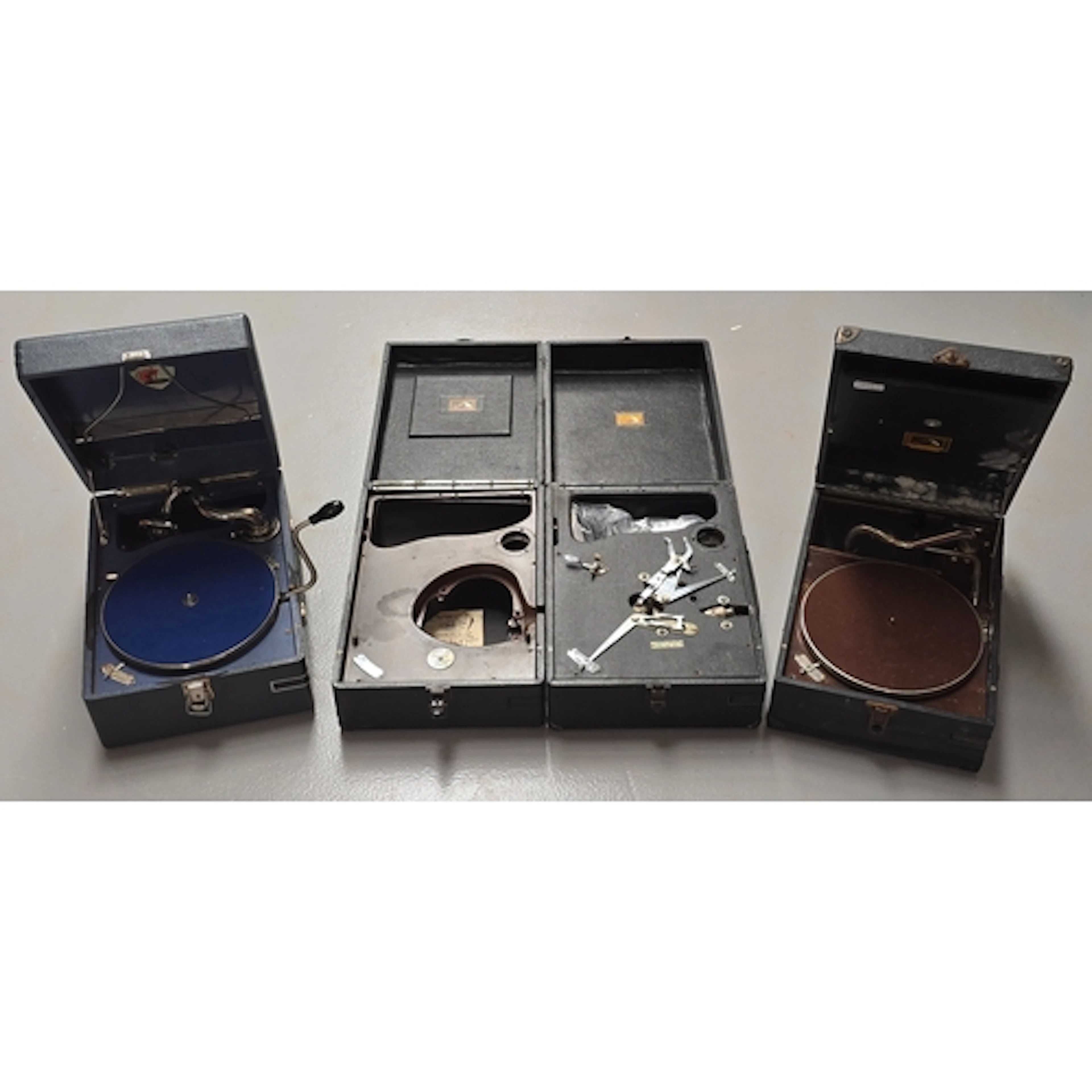 A collection of HMV gramophones for spares/repair. Four in a...