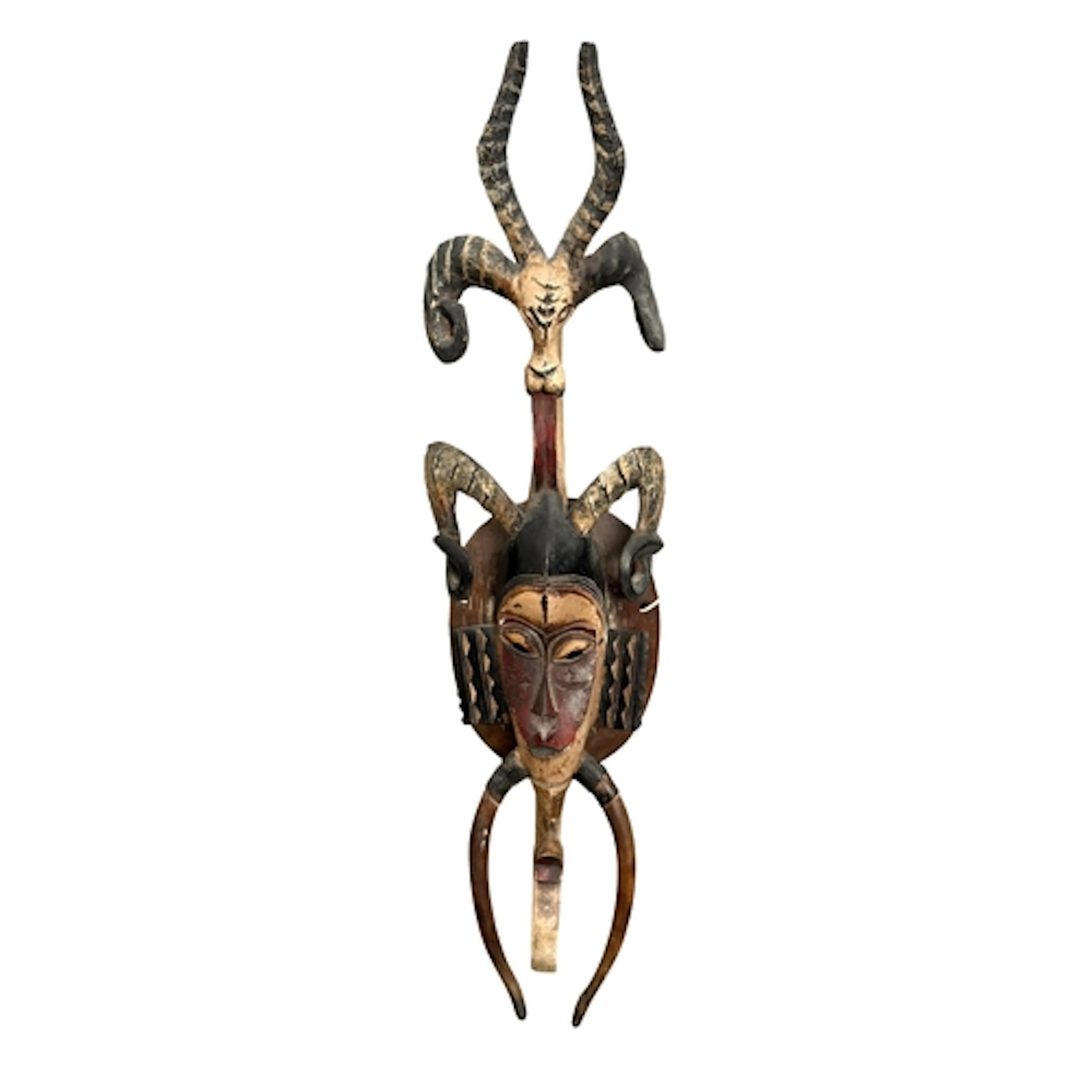 A carved and hand painted African Guro or Baule wooden mask ...