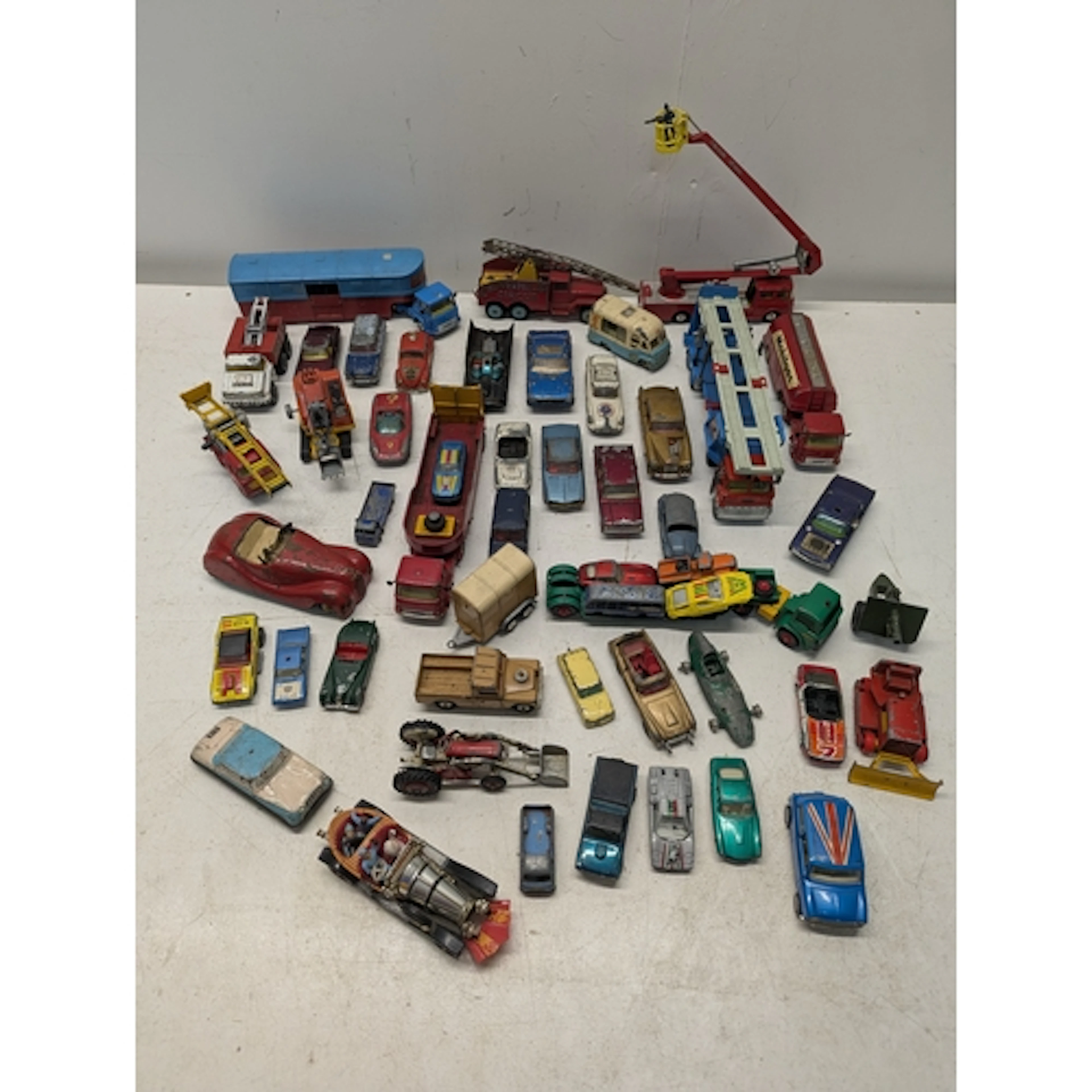 A collection of mainly playworn Corgi vehicles all unboxed t...