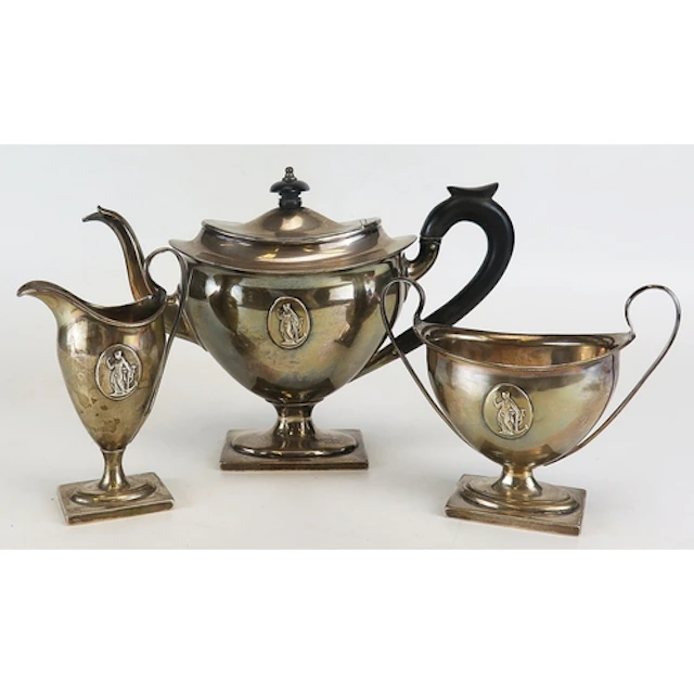 An Edward VII silver three piece tea set, maker Thomas Bradb...