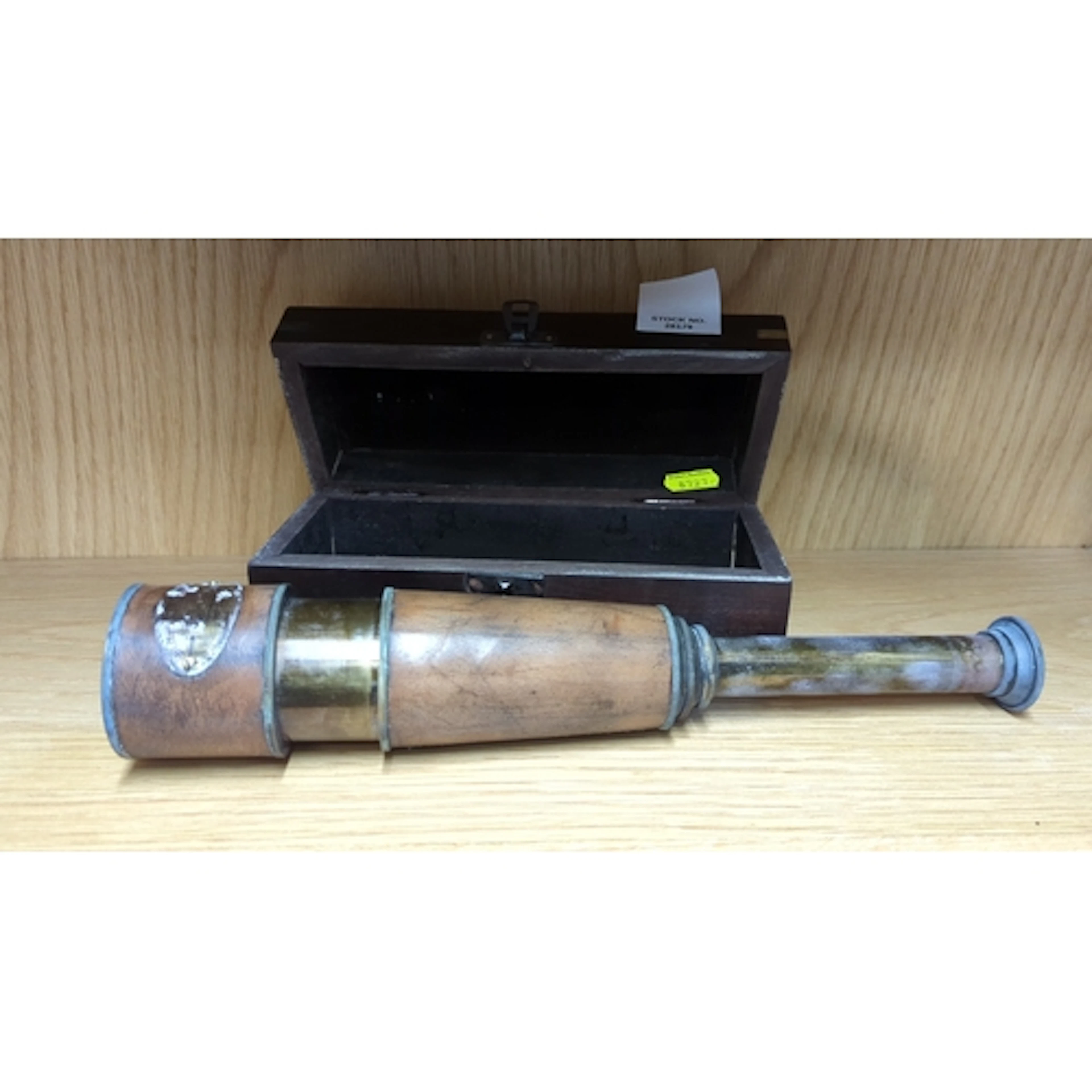 A marine telescope by W. Ottway & Co., with leather-cove...