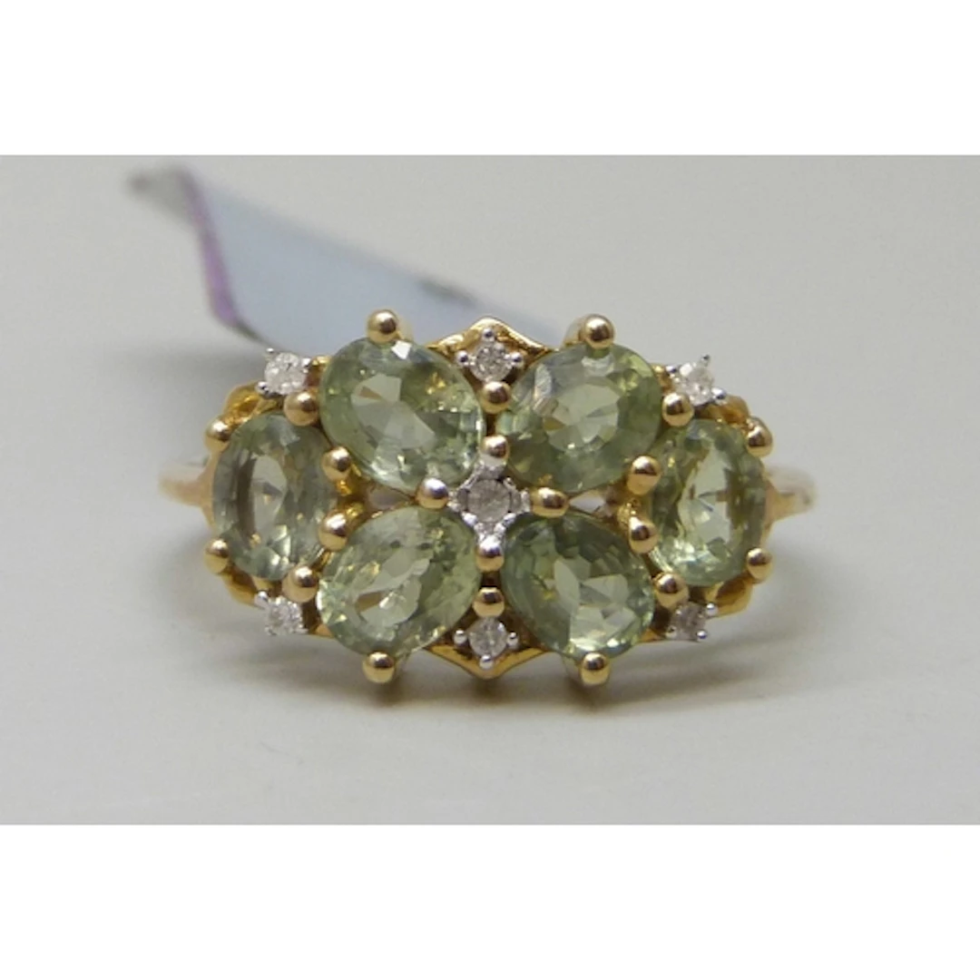 A Gemporia 9ct gold, possibly green sapphire and diamond rin...