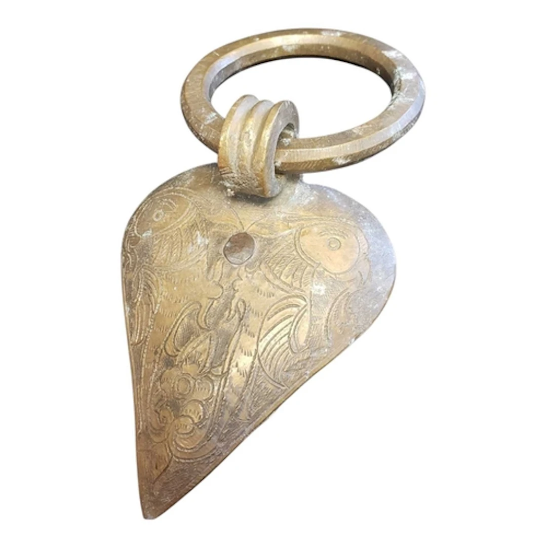 20th century Indian brass door knocker. Featuring a love hea...