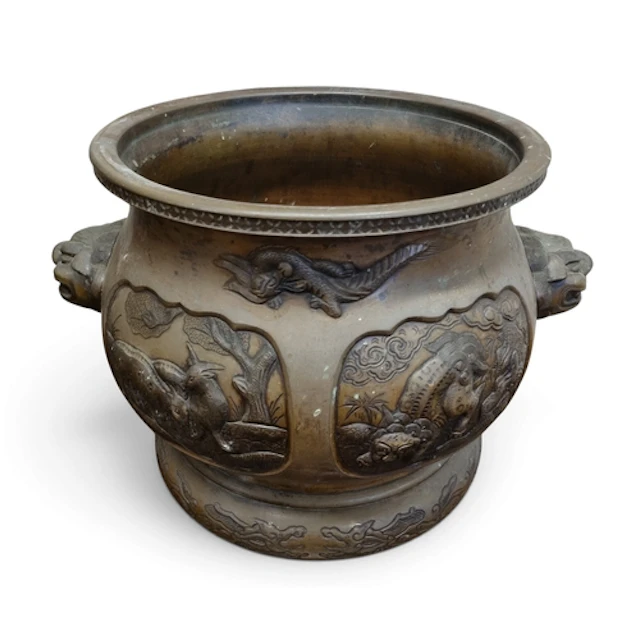 A good Oriental Bronze Cauldron with panelled decoration dep...