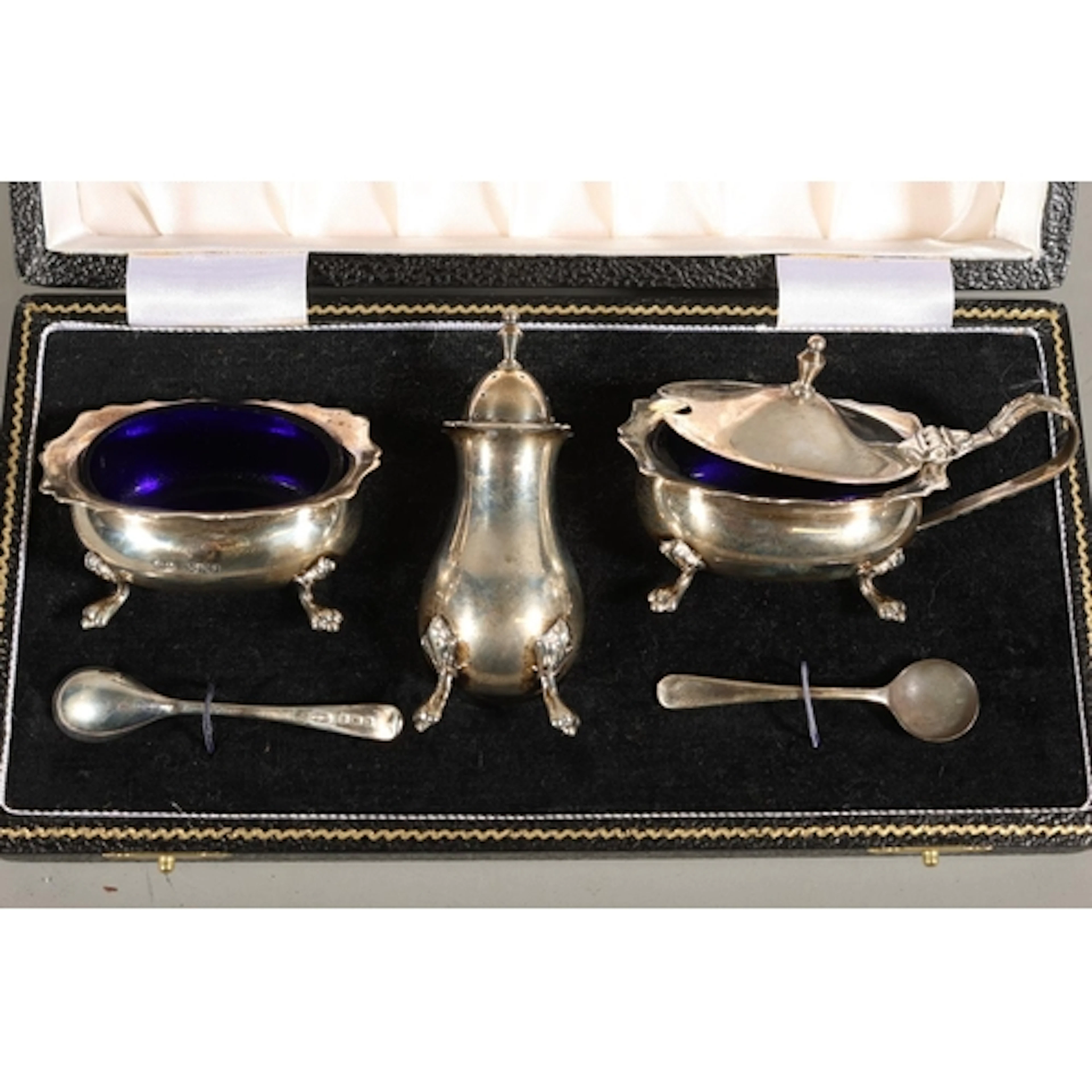 Silver three piece cruet set with matching salt spoons by W ...
