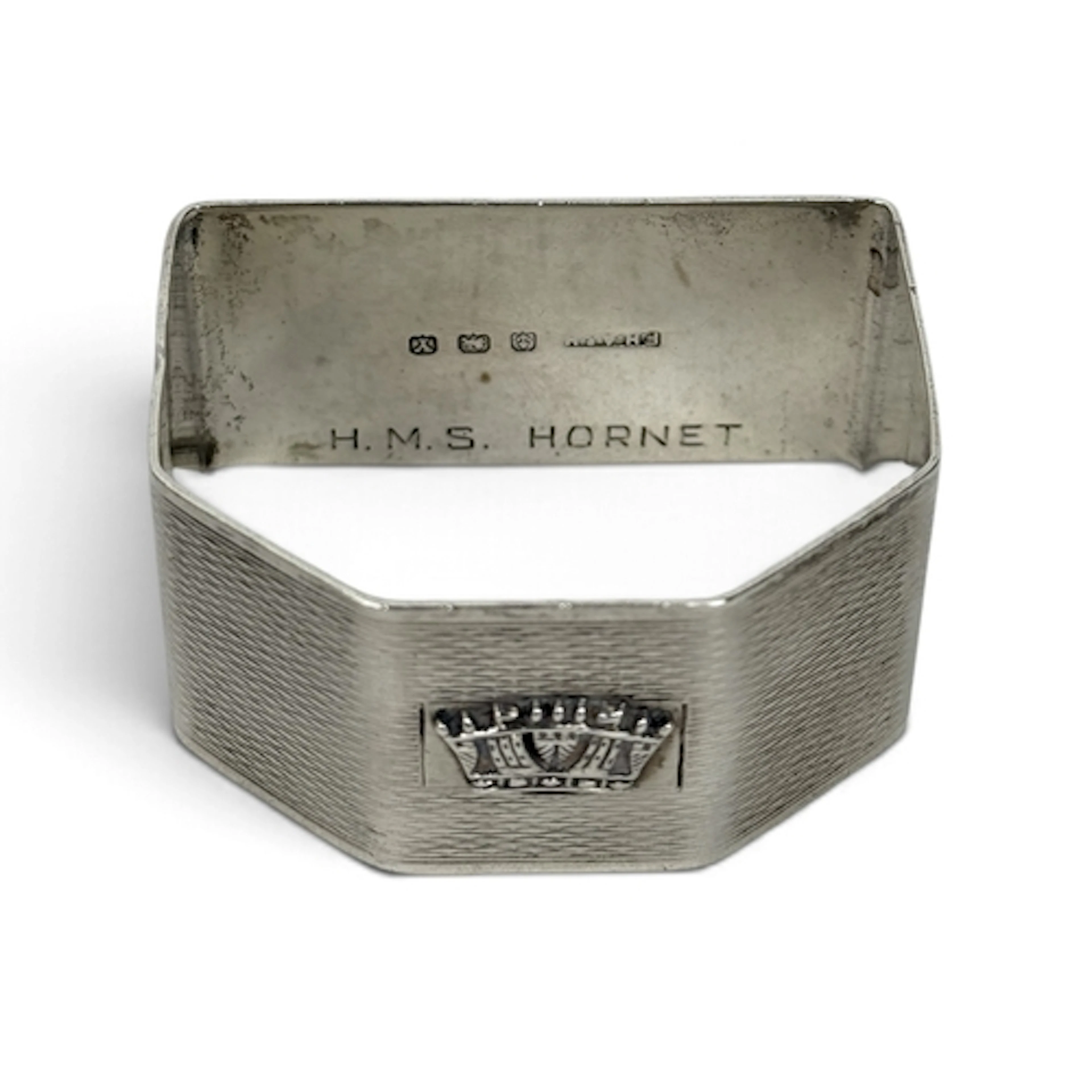 AN ENGINE TURNED SILVER NAPKIN RING, BIRMINGHAM 1948, INSCRI...