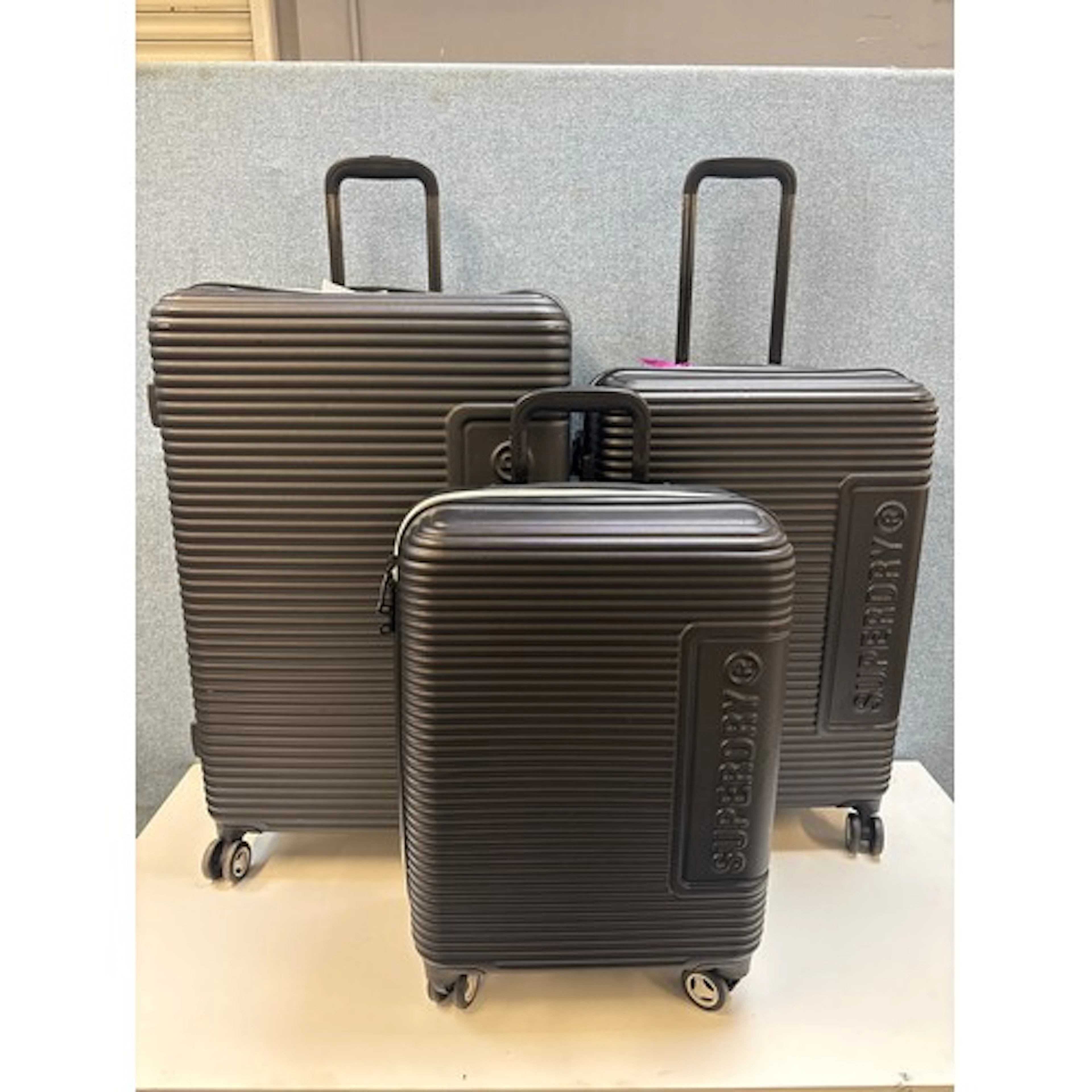 A Superdry luggage 3 piece set, original RRP £149.99 (405-12...