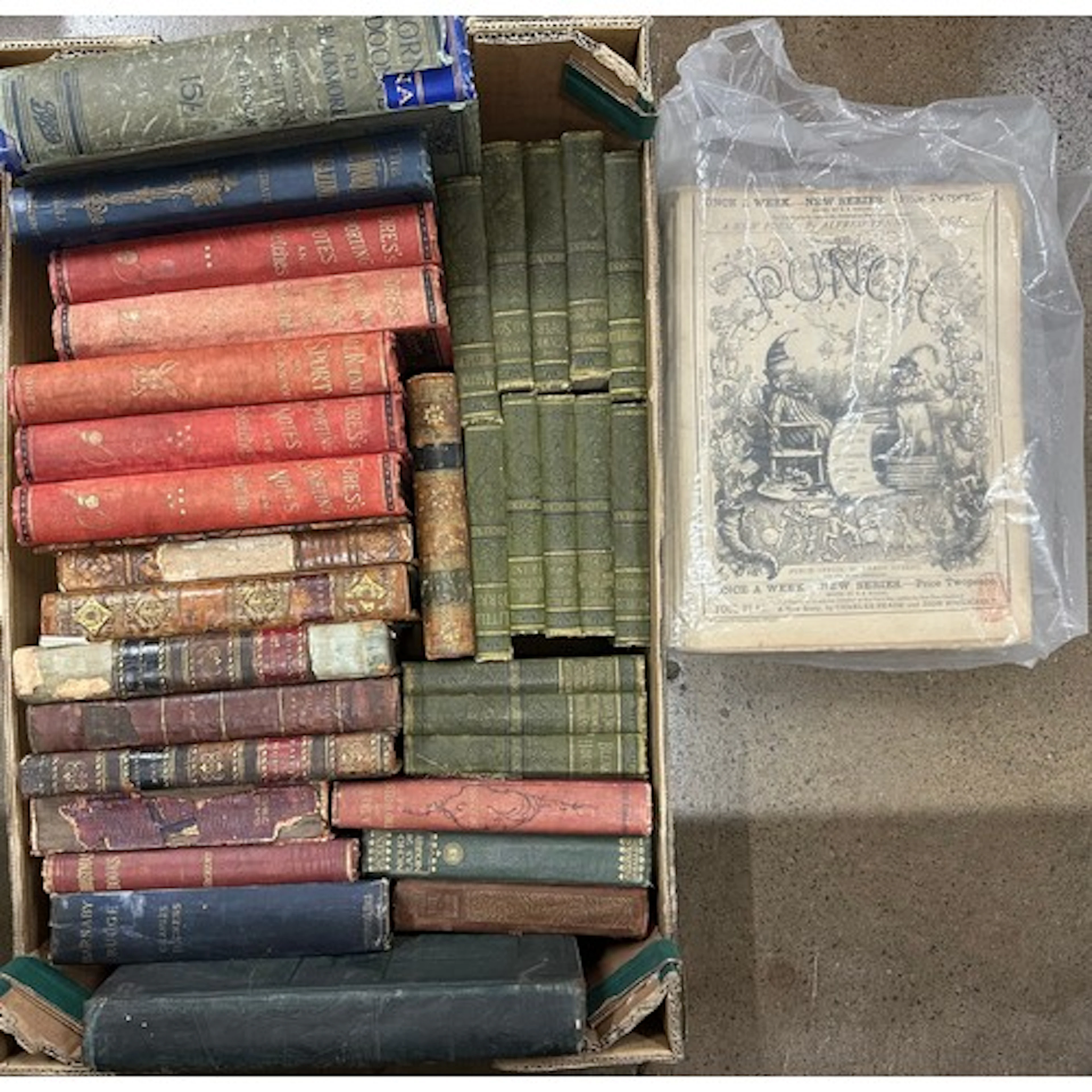 A box of books including a part set of thirteen novels by Ch...
