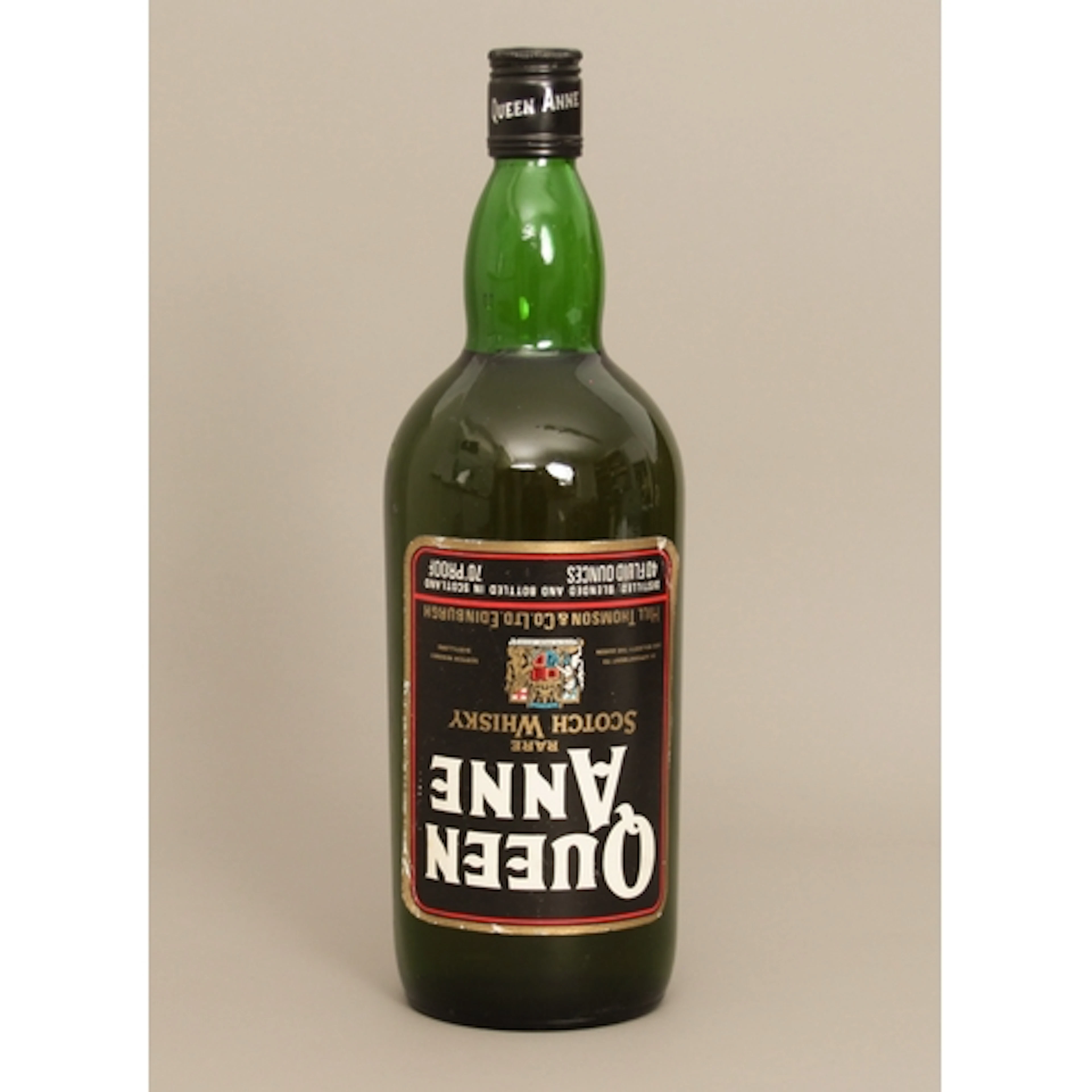 An imperial quart of Queen Anne whisky - 70° proof (40% ABV...