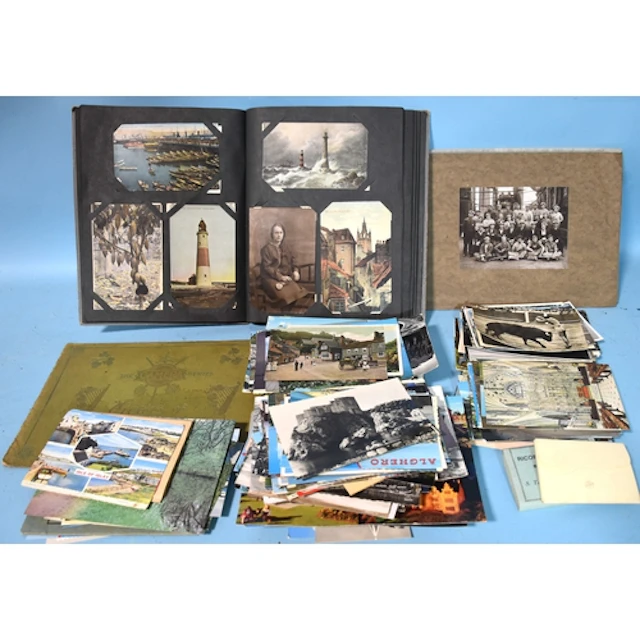 Approximately 550 postcards in an album and loose, mainly la...