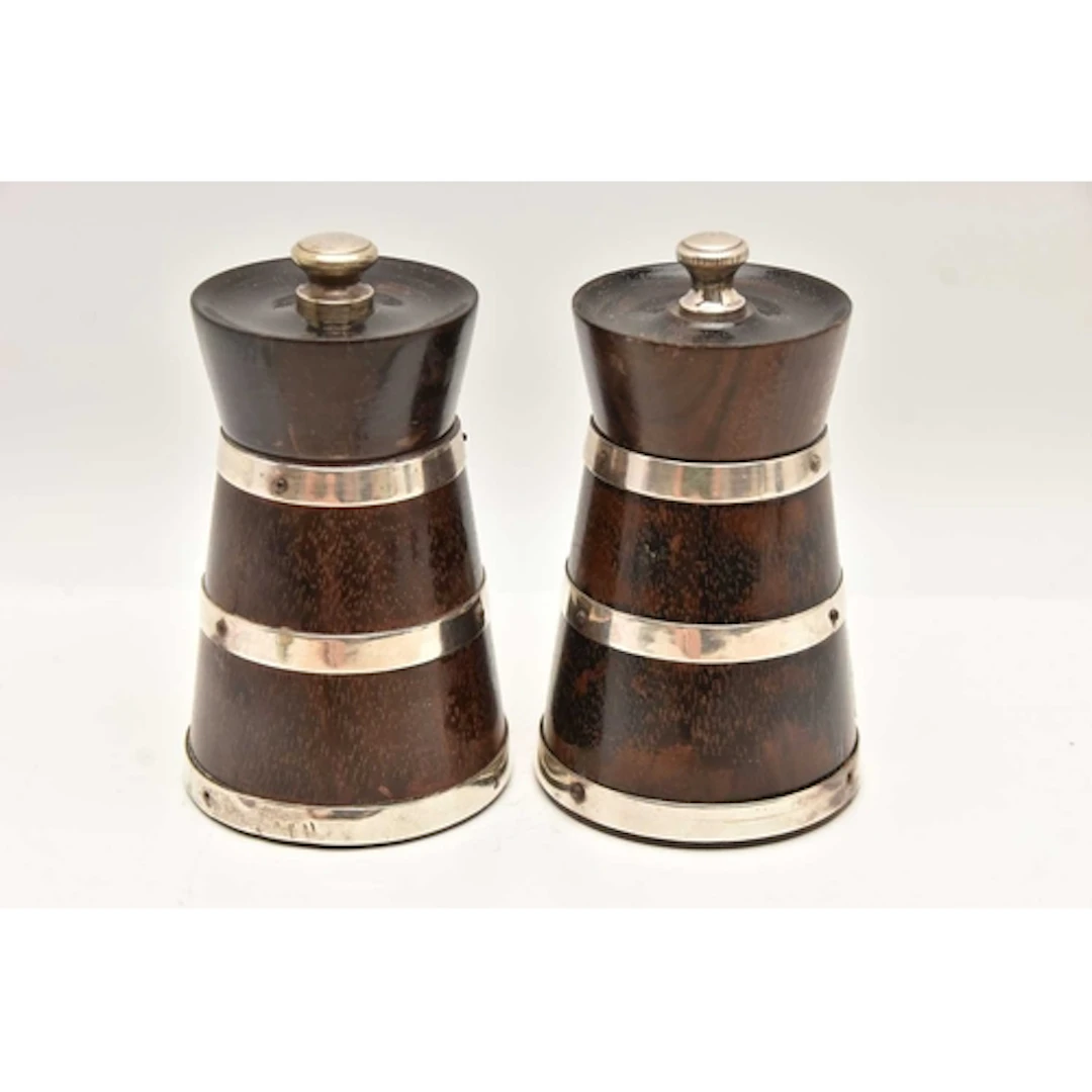 A PAIR OF SILVER MOUNTED HARDWOOD SALT AND PEPPER MILLS, hal...