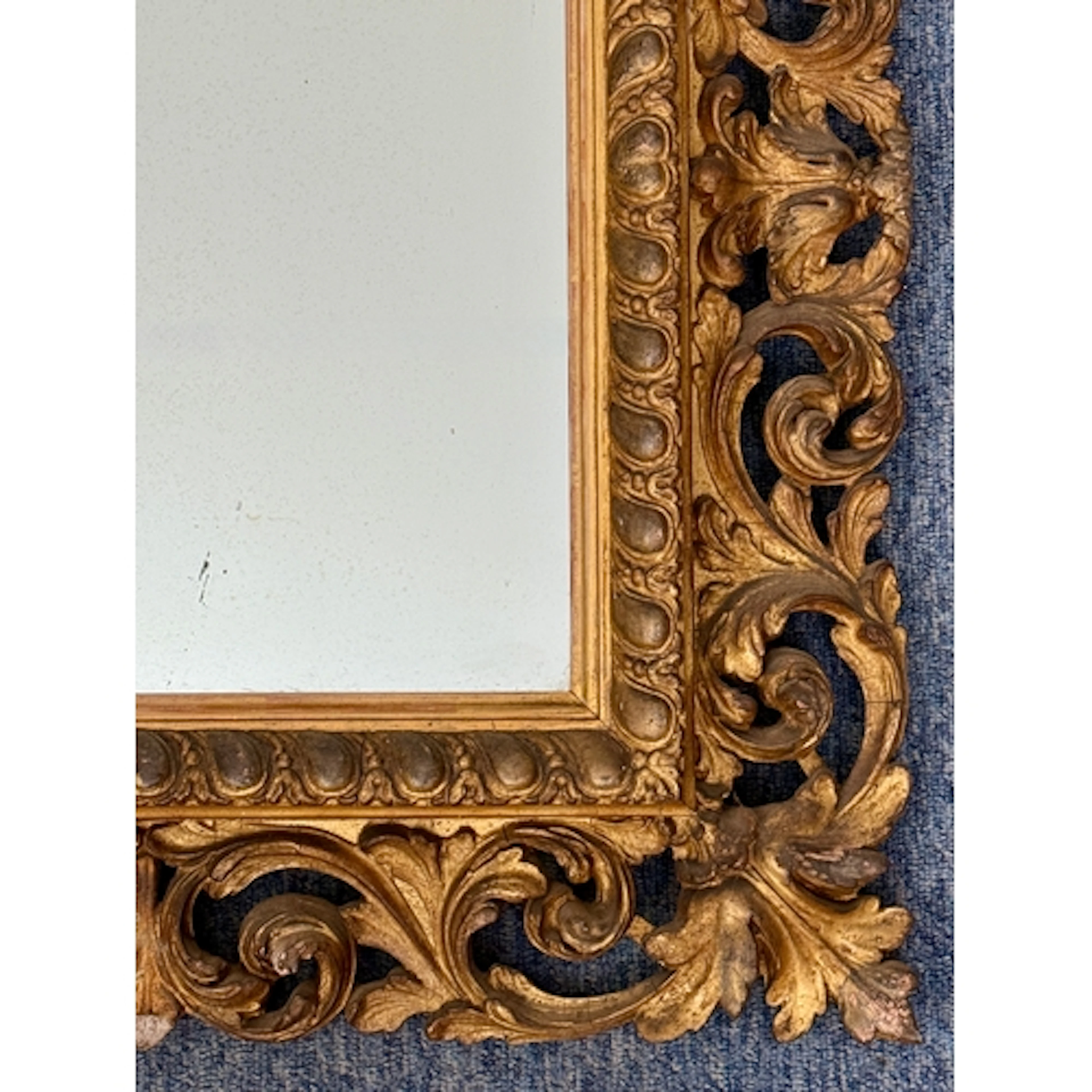 A 19th century gilt and composition mirror in the 18th centu...
