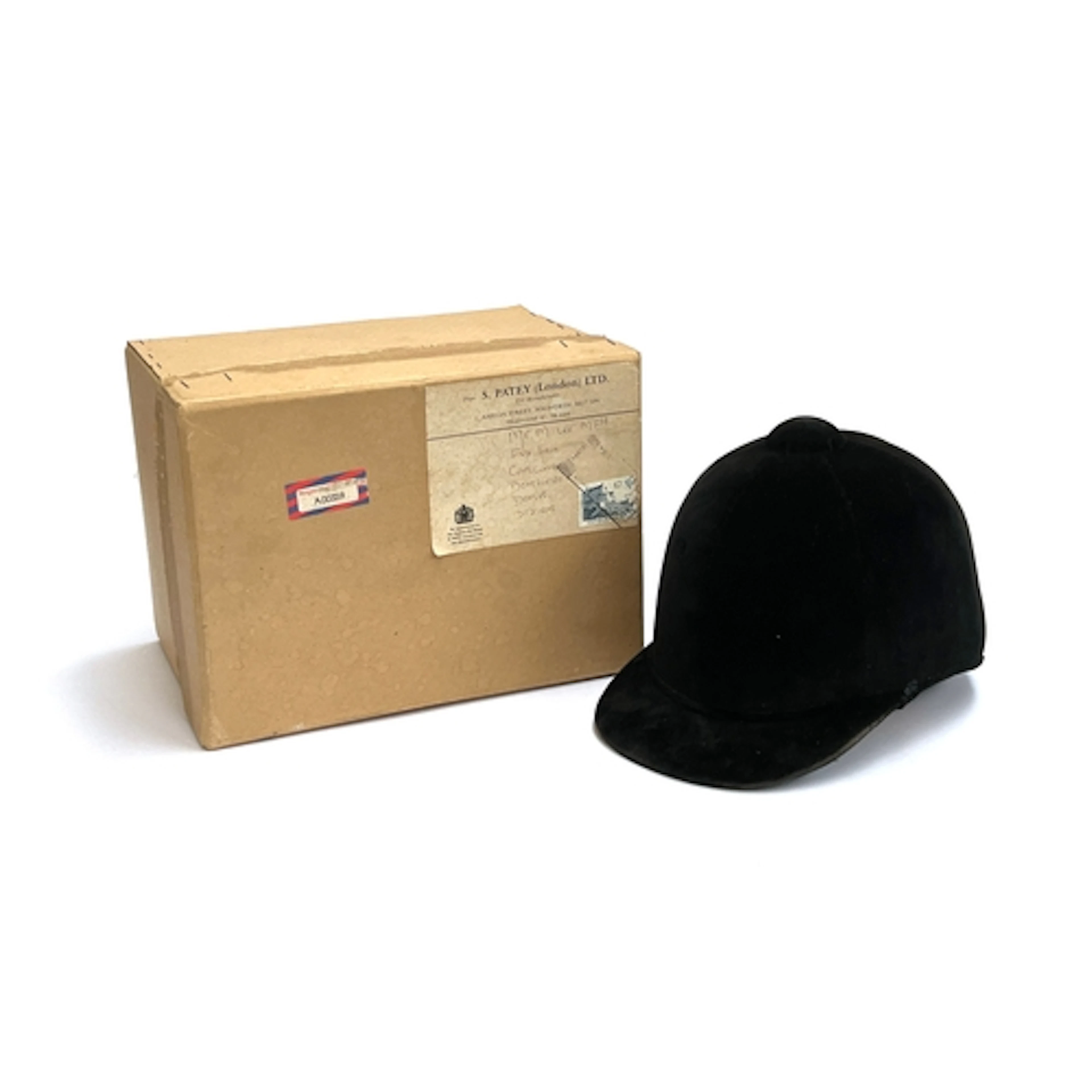 A black velvet Pytchley hunting cap by S. Patey London, 8" f...