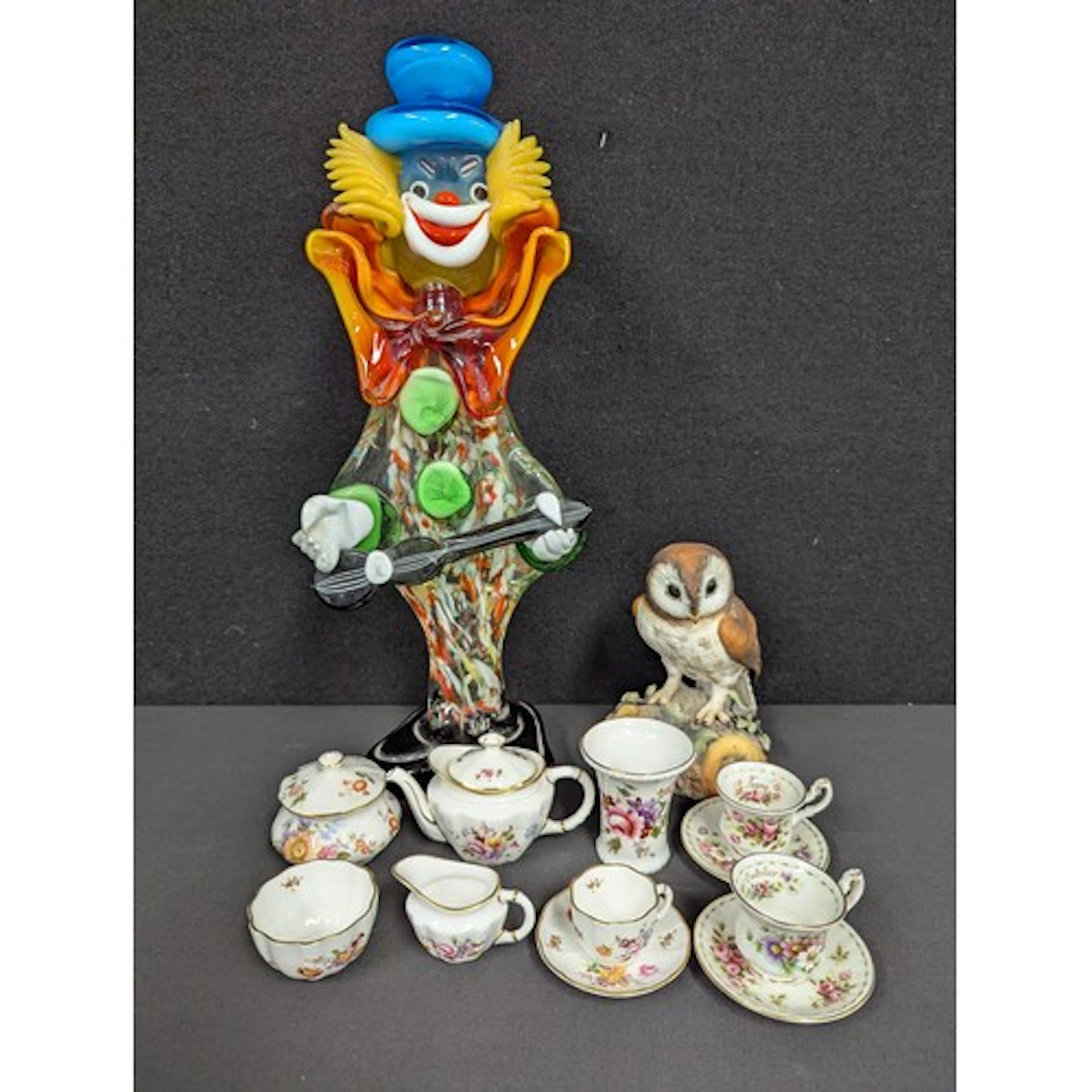 A Royal Crown Derby model Brown Owl, signed T Harper; minia...