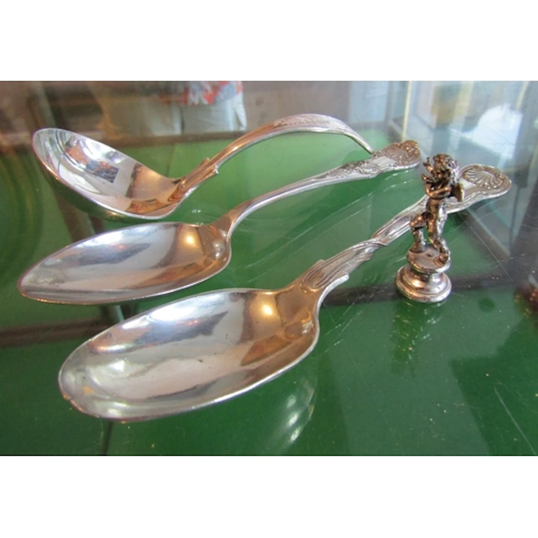 Silver Spoon with Cherub Figure and Two Others