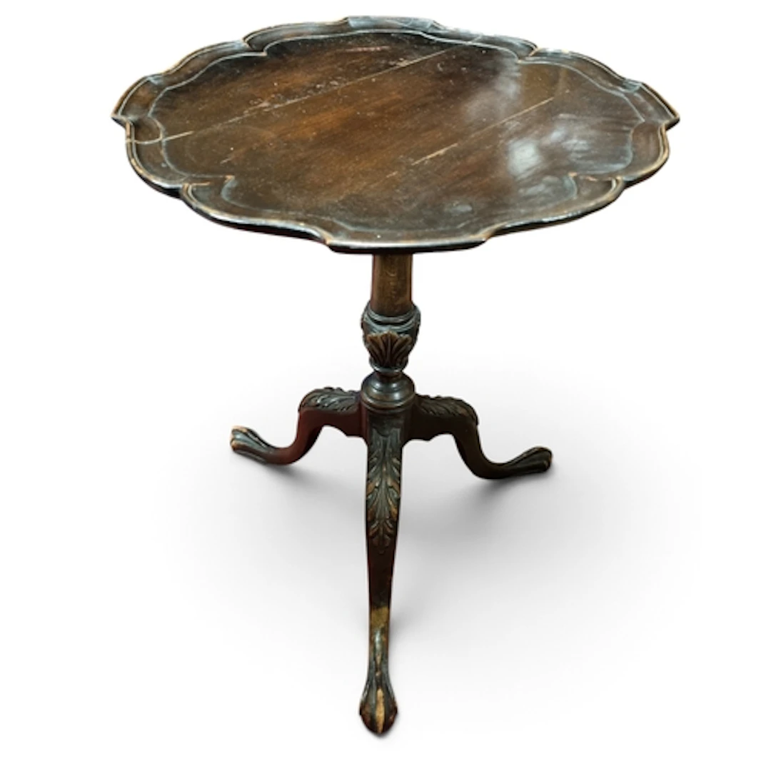 A 19th Century Mahogany scalloped edge Table on tripod suppo...