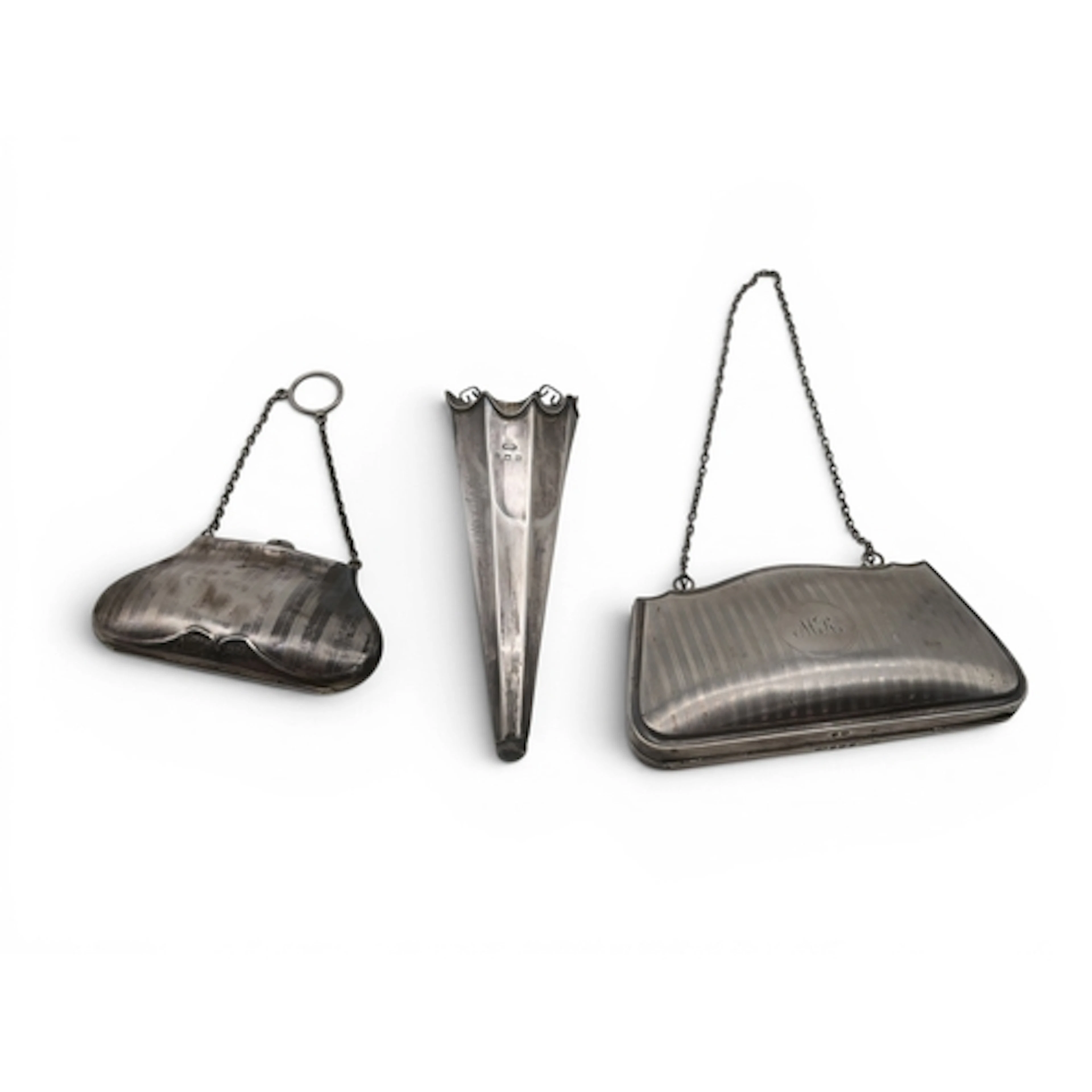 A silver purse, by A & J Zimmerman, Birmingham 1916, and...