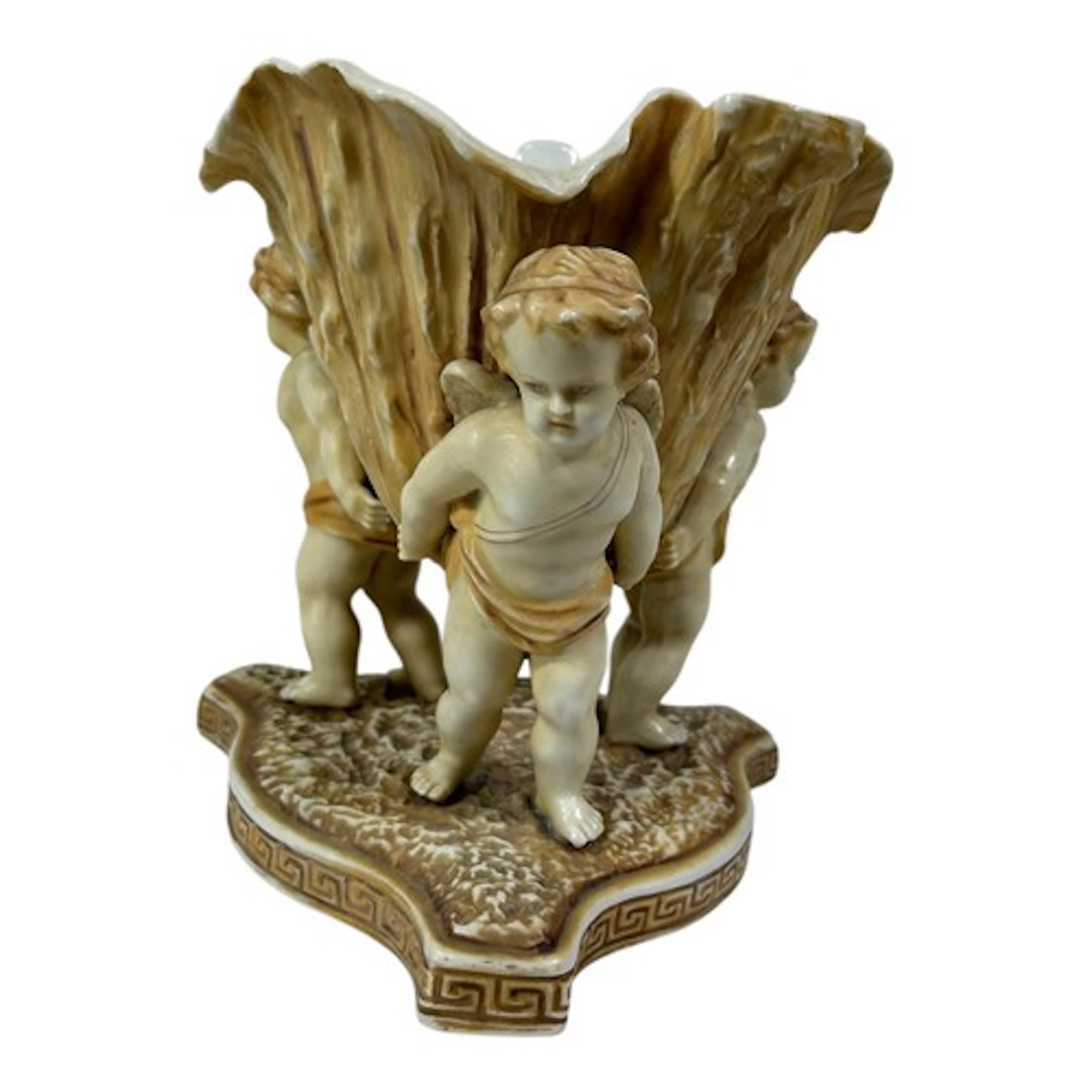 A 19th century German porcelain table centre in the form of ...