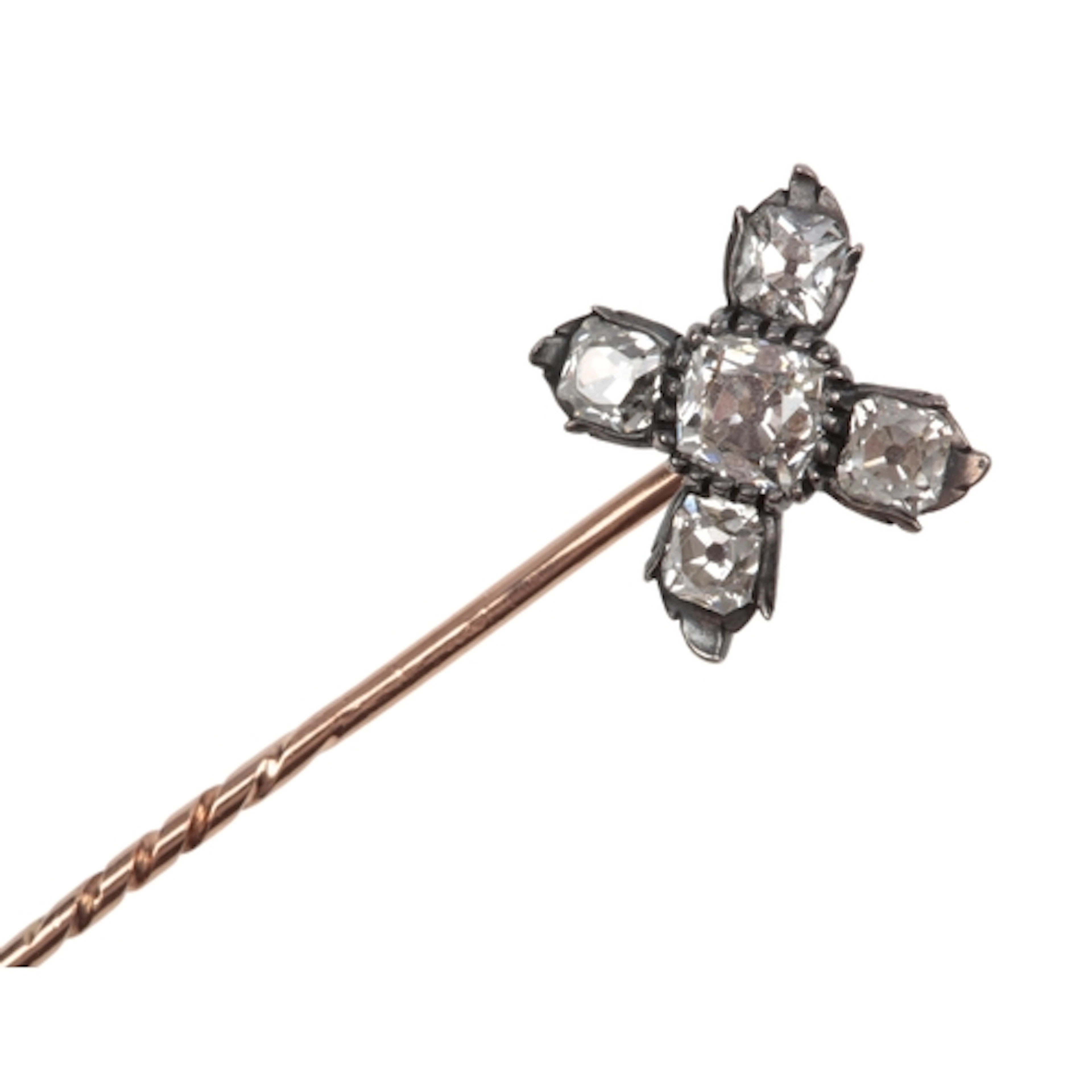 An attractive diamond stick pin, late 19th century, of quatr...