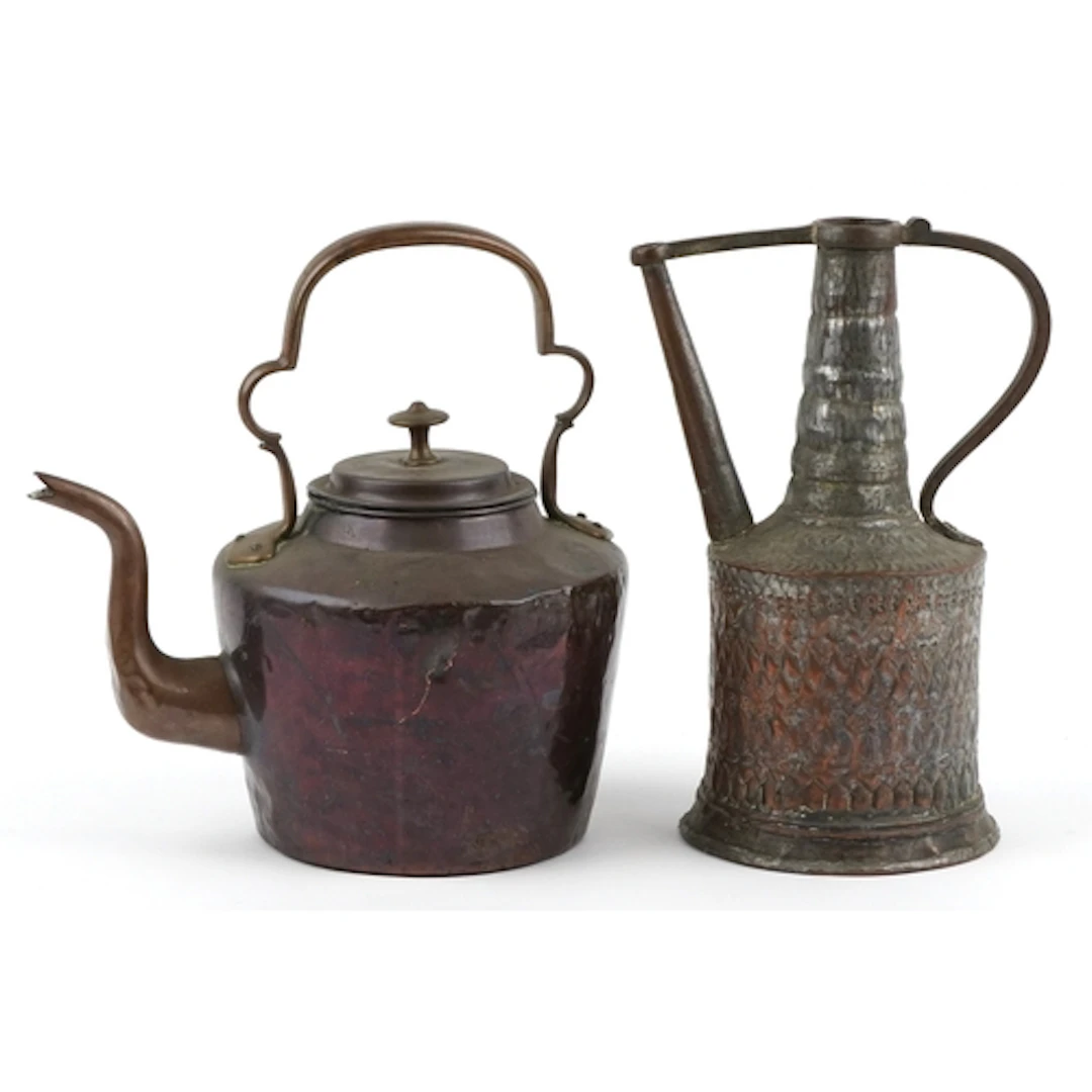 Two antique Middle Eastern copper vessels comprising a hamme...