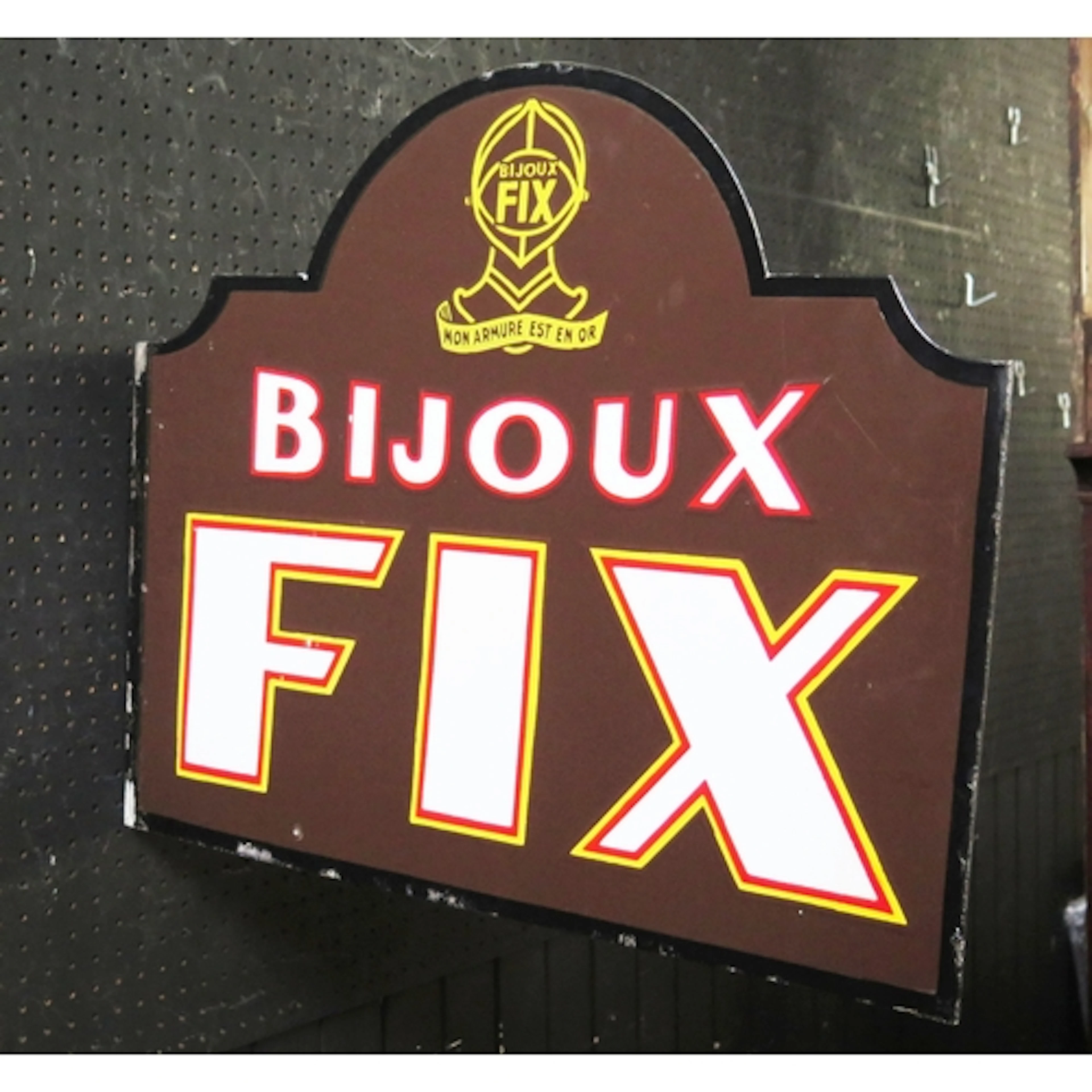 "Bijoux Fix" - an enamel double sided advertising sign, 56cm...