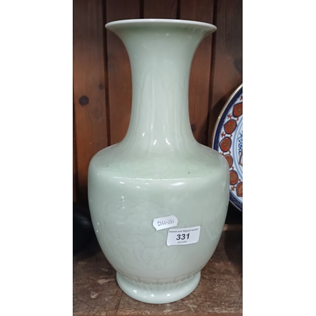 A Chinese Celadon green vase.